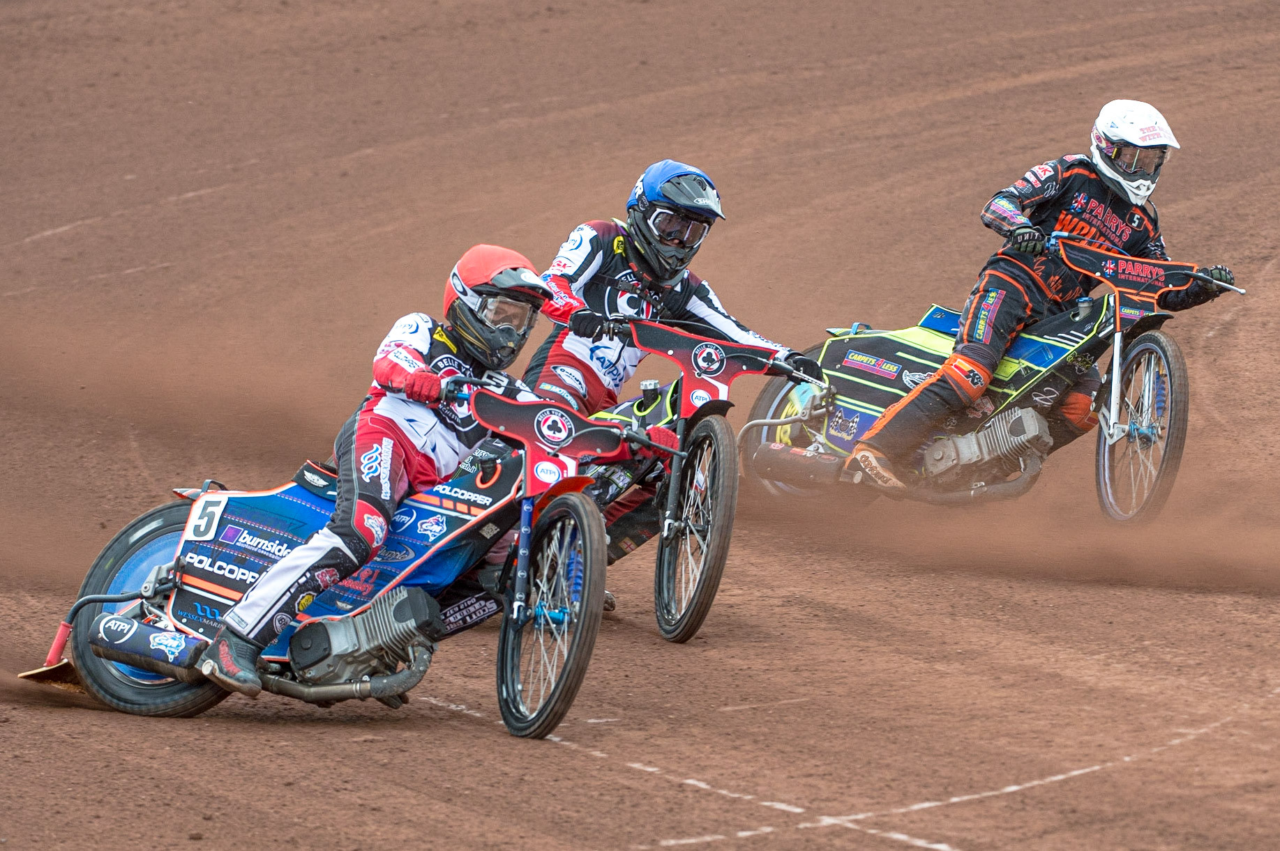 MANCHESTER, UK. JUN 13TH Brady Kurtz  (Red) and  Tom Brennan  (Blue) outside Nick Morris  (White)during the SGB Premiership match between Belle Vue Aces and Wolverhampton  Wolves at the National Speedway Stadium, Manchester on Monday 13th June 2022. (Credit: Ian Charles | MI News)