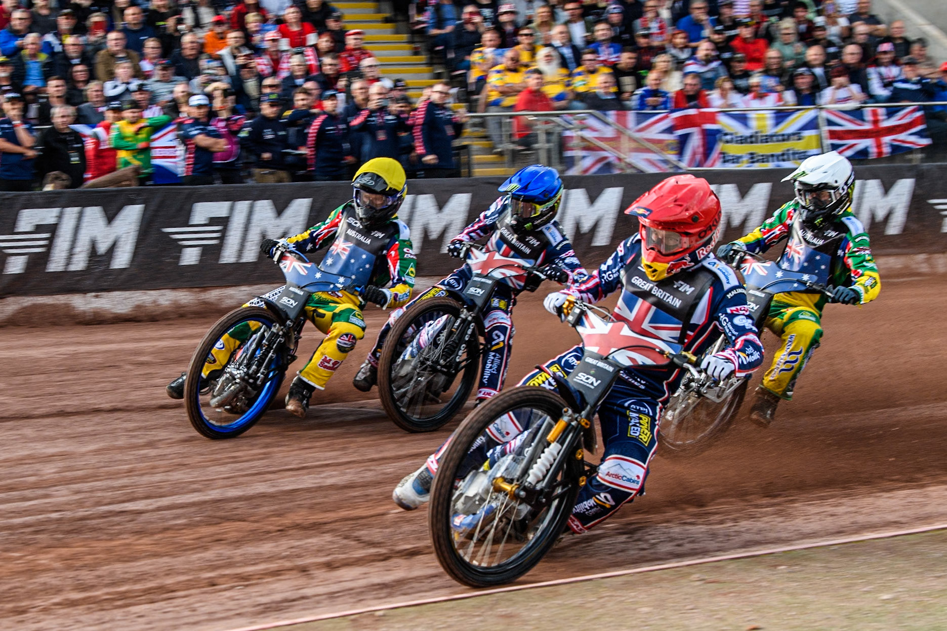 GREAT BRITAIN v AUSTRALIA: Robert Lambert of Great Britain in Red leading Brady Kurtz of Australia in Yellow, Jack Holder of Australia in White and Dan Bewley of Great Britain in Blue during the Monster Energy FIM Speedway of Nation Final at the National Speedway Stadium, Manchester on Saturday 13th July 2024. (Photo: Ian Charles | MI News)