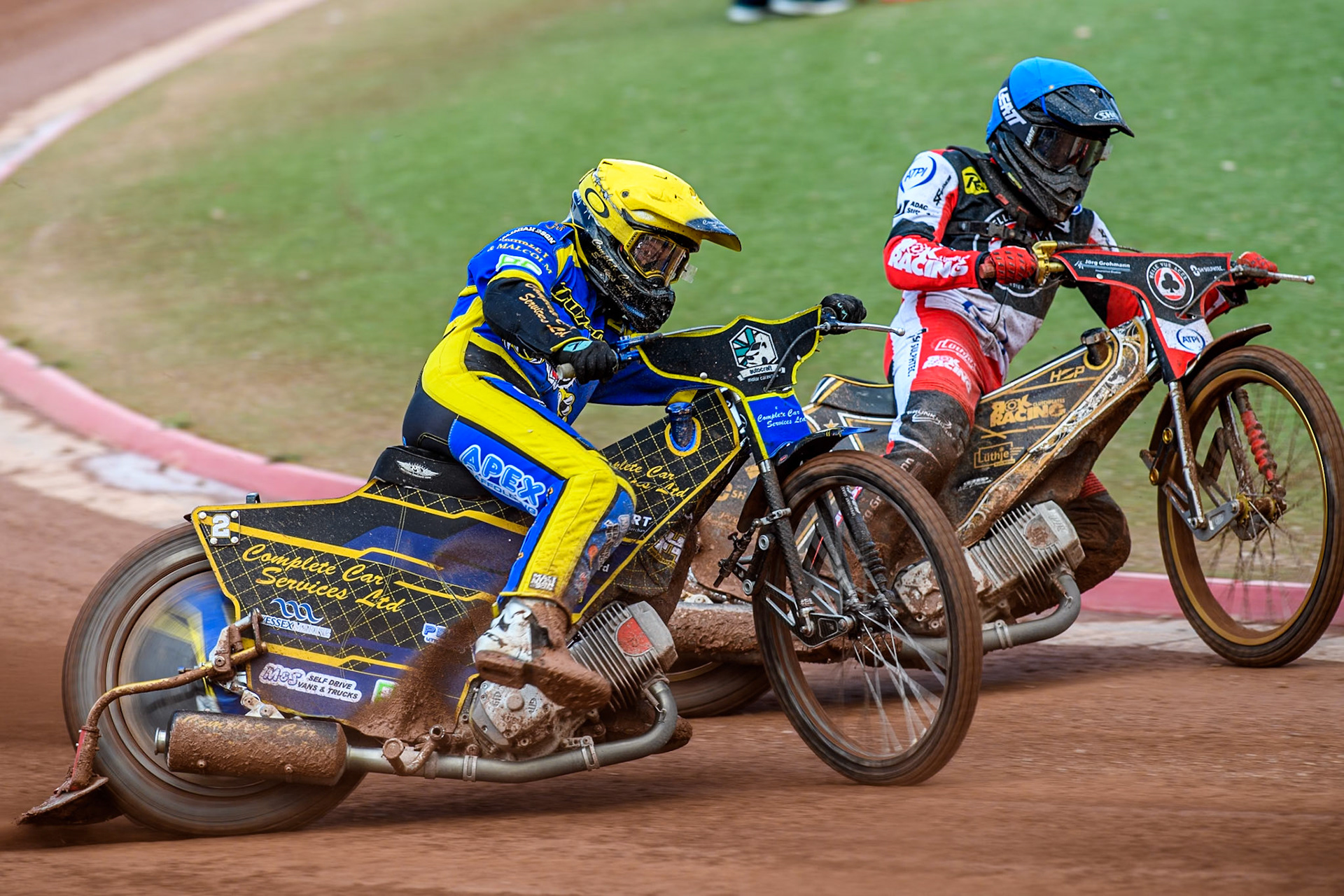 Sheffield Tigers' Kyle Howarth  in Yellow rides outside Belle Vue Aces' Norick Blödorn  in Blue during the Rowe Motor Oil Premiership match between Belle Vue Aces and Sheffield Tigers at the National Speedway Stadium, Manchester on Monday 26th August 2024. (Photo: Ian Charles | MI News)