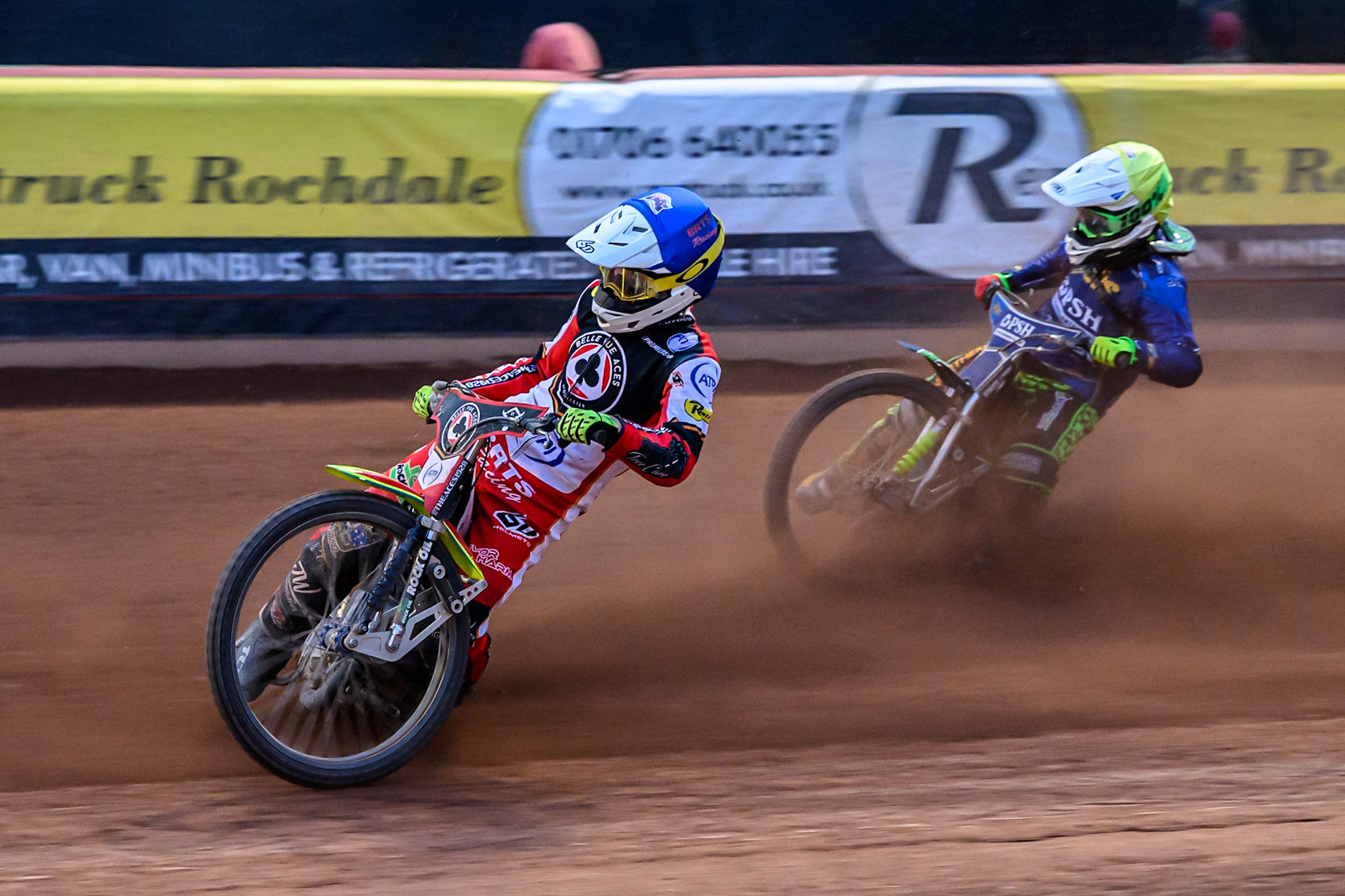Belle Vue Aces' Tate Zischke in Blue leading Kings Lynn Stars' Guest Rider, Anders Rowe in Yellow during the Rowe Motor Oil Premiership match between Belle Vue Aces and King's Lynn Stars at the National Speedway Stadium, Manchester on Monday 23rd June 2025. (Photo: Ian Charles | MI News)