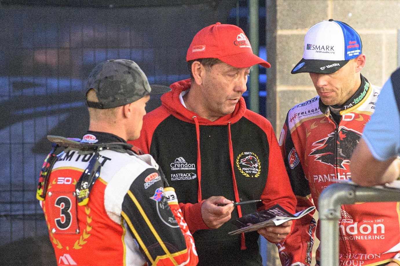 MANCHESTER, UK. AUG 9TH  Rob Lyon  (centre) with Michael Palm Toft  (left) and Bjarne Pedersen  during the SGB Premiership match between Belle Vue Aces and Peterborough at the National Speedway Stadium, Manchester on Monday 9th August 2021. (Credit: Ian Charles | MI News)