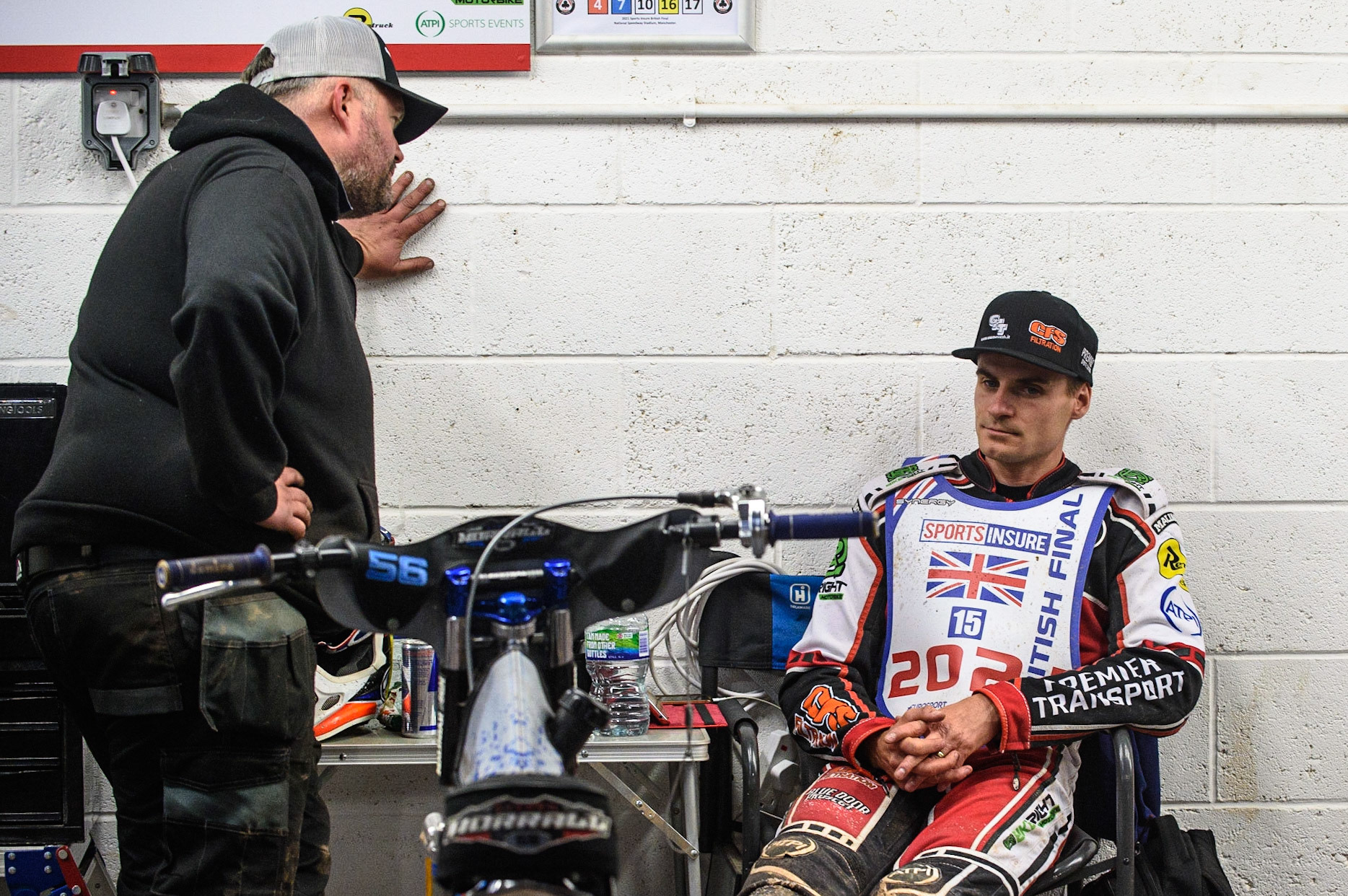 MANCHESTER, UK. AUGUST 16TH   Steve Worrall  listens to his mechanic during the Sports Insure British Speedway Finals at the National Speedway Stadium, Manchester on Monday 16th August 2021. (Credit: Ian Charles | MI News)