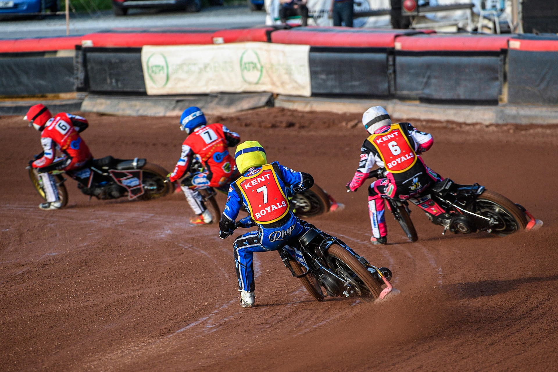 Rhys Naylor (Yellow) chases Sam Woolley (White) Luke Muff (Blue) and Paul Bowen (Red) during the National Development League match between Belle Vue Colts and Kent Royals at the National Speedway Stadium, Manchester on Friday 7th July 2023. (Photo: Ian Charles | MI News)