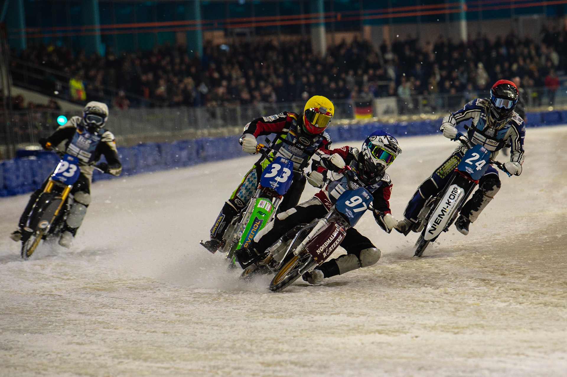 HEERENVEEN, NL. Ove Ledström (97) (Blue) leads Max Koivula (24) (Red), Johann Weber (33)  (Yellow) and Franz Mayerbüchler (93) (White) during the FIM Ice Speedway Gladiators World Championship Final 3 at Ice Rink Thialf, Heerenveen on Saturday  2 April 2022. (Credit: Ian Charles | MI News)