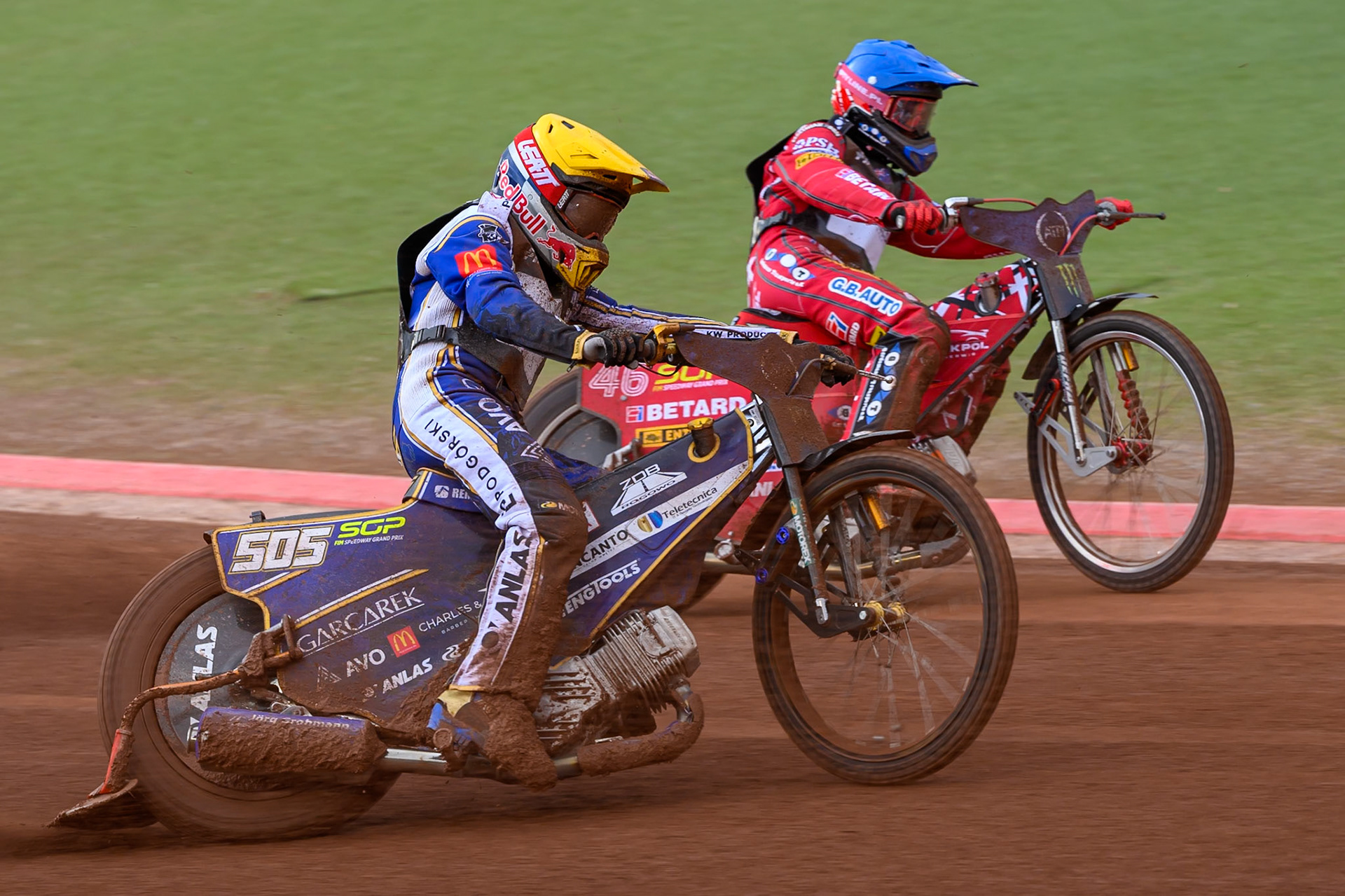Robert Lambert (505) of Great Britain in Yellow rides outside Max Fricke (46) of Australia in Blue during the ATPI  FIM Speedway GP of Manchester at the National Speedway Stadium, Manchester on Friday 5th June 2026. (Photo: Ian Charles | MI News)