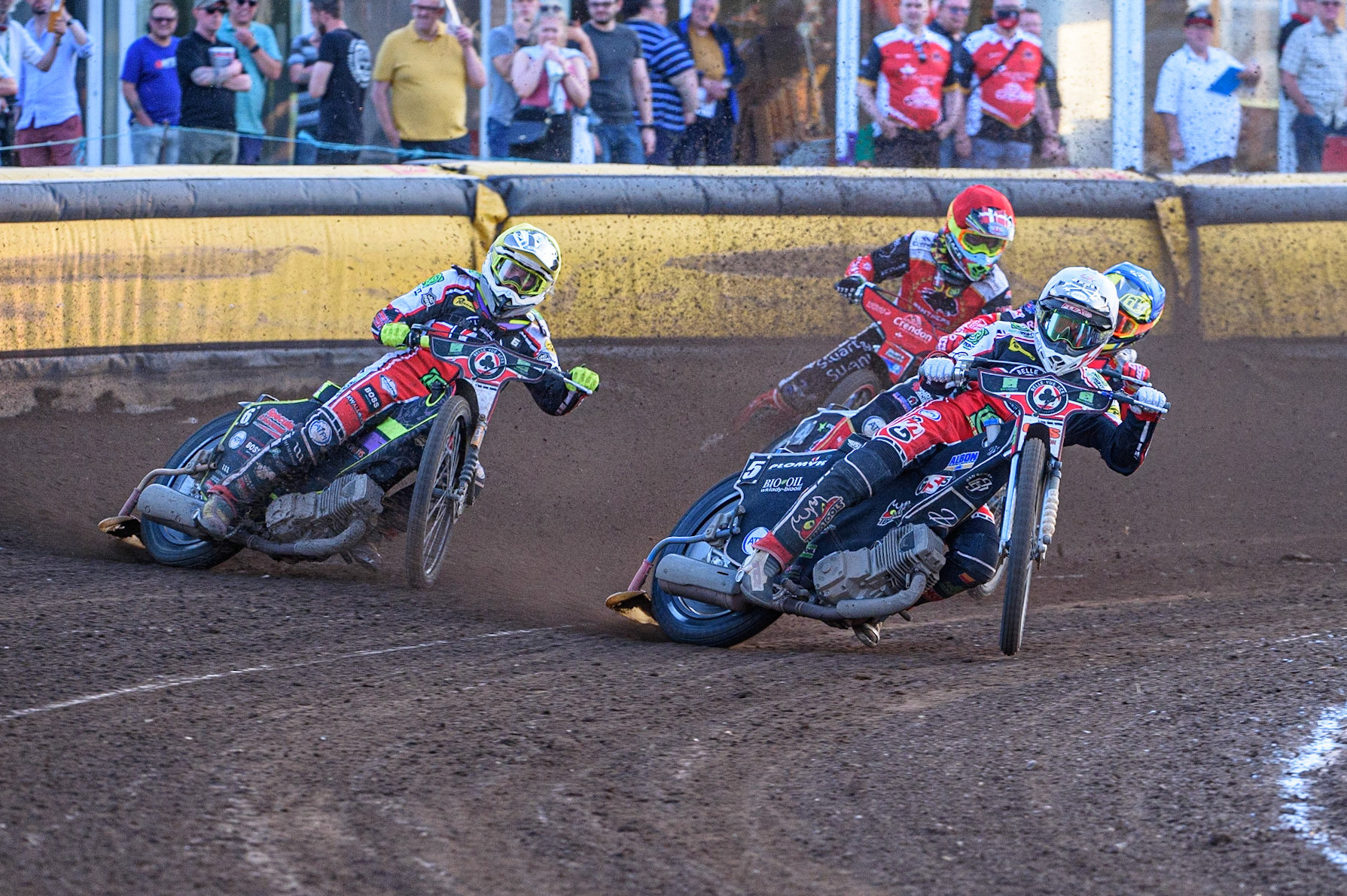 PETERBOROUGH, UK. JULY 19TH  Dan Bewley  (White) and Tom Brennan  (Yellow) lead Scott Nicholls   (Blue) and Michael Palm-Toft (Red) during the SGB Premiership match between Peterborough and Belle Vue Aces at East of England Showground, Peterborough on Monday 19th July 2021. (Credit: Ian Charles | MI News)