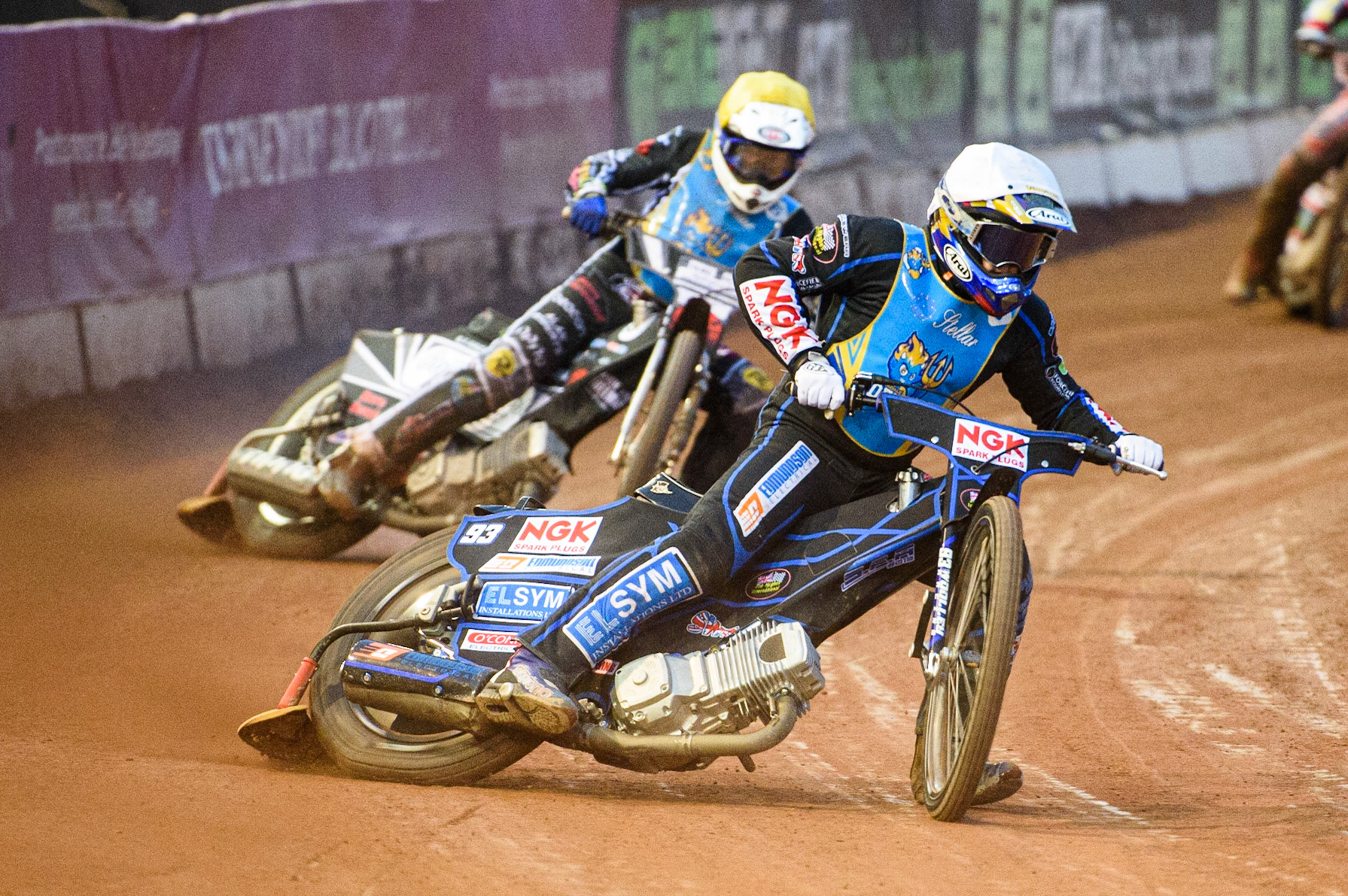 MANCHESTER, UK. AUGUST 20TH Tom Woolley  (White) leads Archie Freeman  (Yellow) during the National Development League match between Belle Vue Aces and Armadale Devils at the National Speedway Stadium, Manchester on Friday 20th August 2021. (Credit: Ian Charles | MI News)