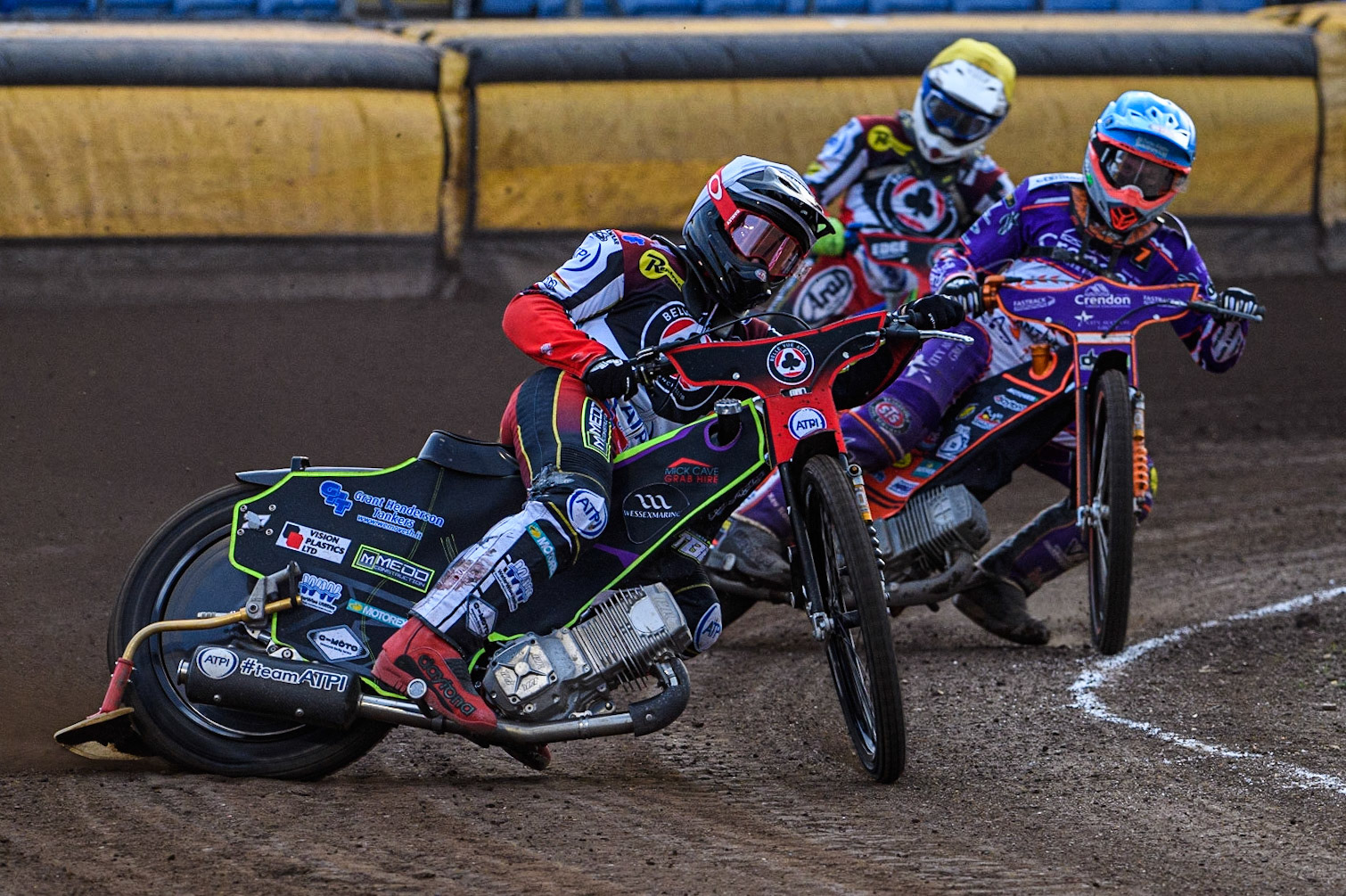 Tom Brennan (White) leads Jordan Jenkins (Blue) and Jake Mulford  (Yellow) during the Sports Insure Premiership match between Peterborough and Belle Vue Aces at East of England Showground, Peterborough on Monday 26th June 2023. (Photo: Ian Charles | MI News)