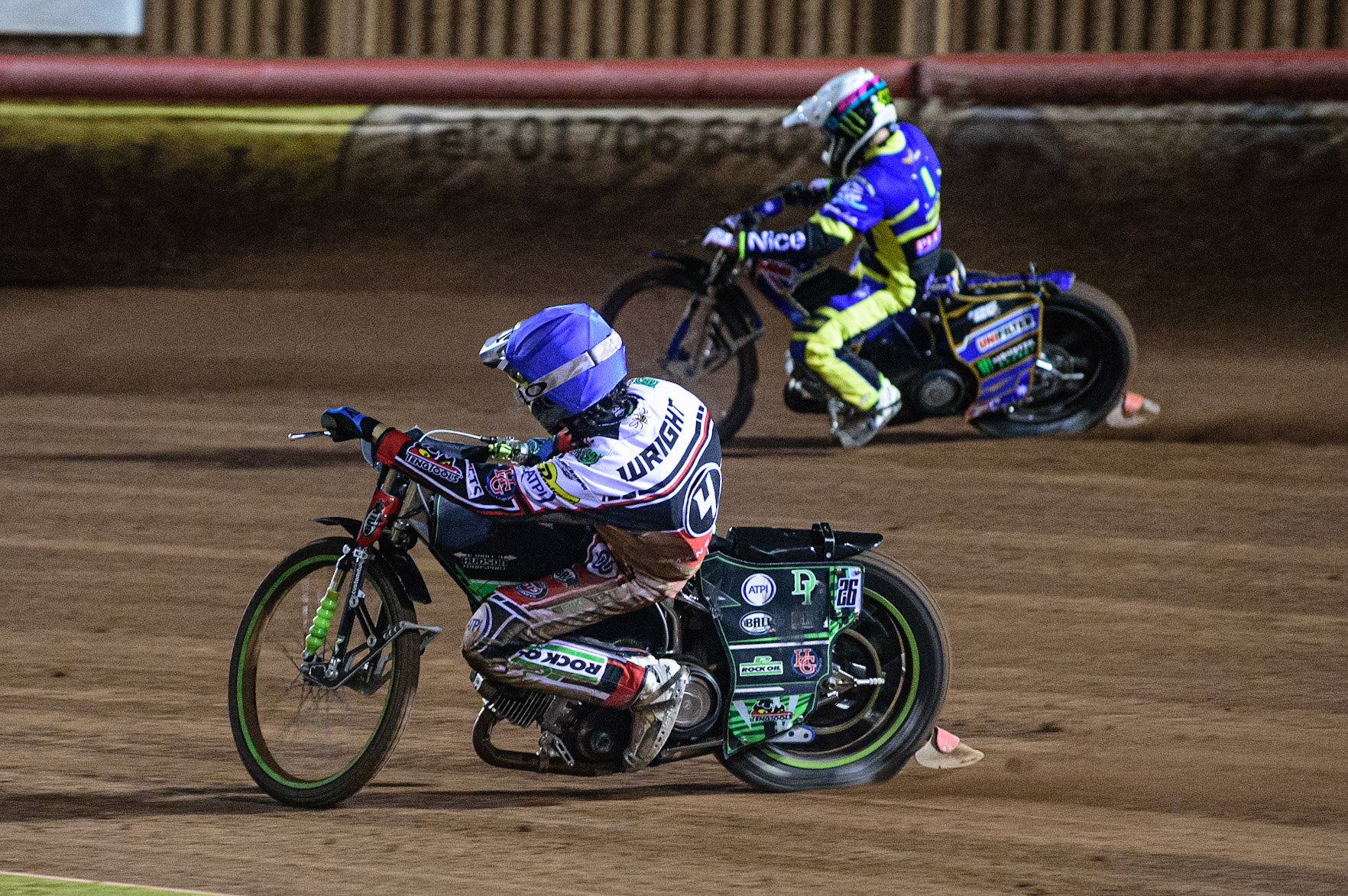 MANCHESTER, UK. OCT 7TH  Charles Wright  (Blue) tries to pass Jack Holder  (White) on the inside during the SGB Premiership Play off Semi-Final Second Leg between Belle Vue Aces and Sheffield Tigers at the National Speedway Stadium, Manchester on Thursday 7th October 2021. (Credit: Ian Charles | MI News)