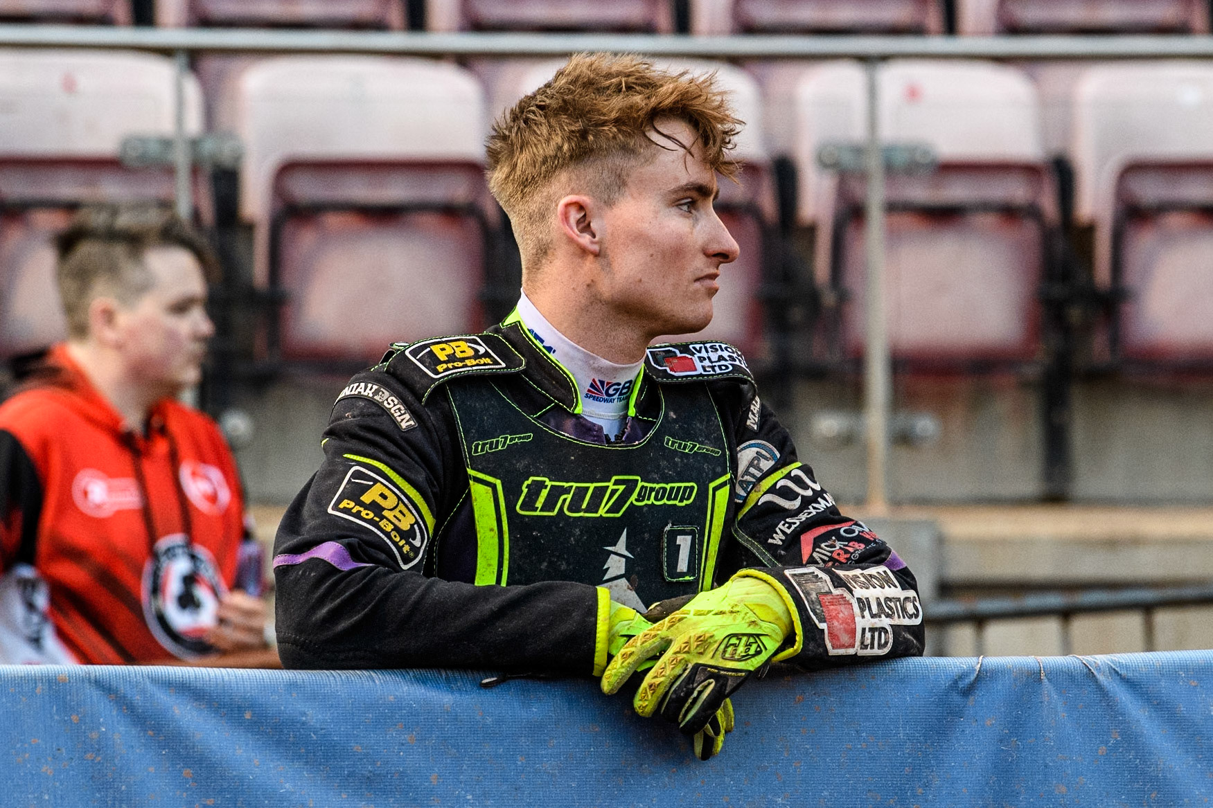 Ipswich Witches' Guest Rider Tom Brennan  watches the scene of the crash on the top bend during the Rowe Motor Oil Premiership match between Belle Vue Aces and Ipswich Witches at the National Speedway Stadium, Manchester on Monday 1st July 2024. (Photo: Ian Charles | MI News)