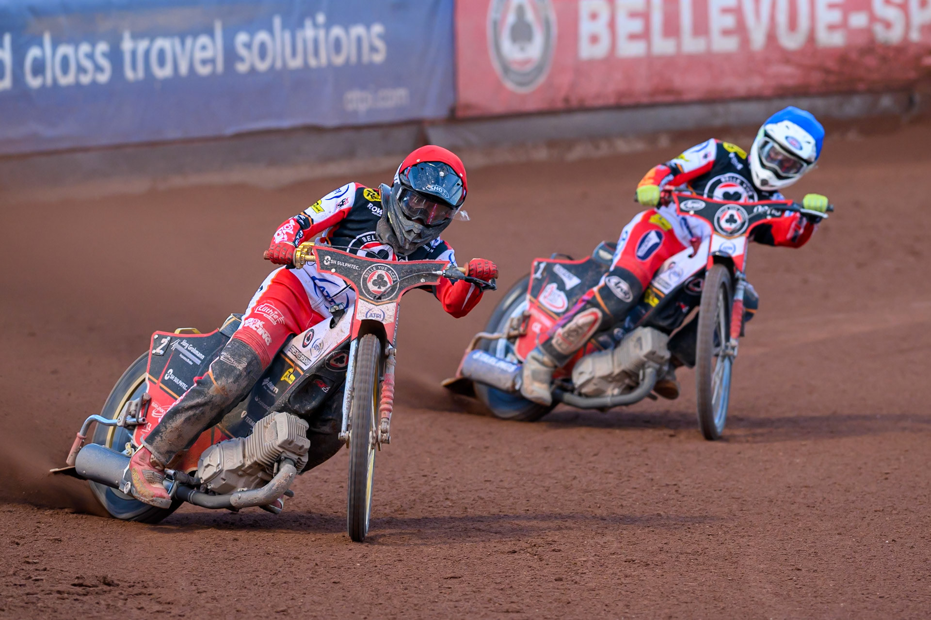 Norick Blödorn of Belle Vue Aces  in Red leading team mate Jake Mulford of Belle Vue Aces  in Blue during the Rowe Motor Oil Premiership match between Belle Vue Aces and Ipswich Witches at the National Speedway Stadium, Manchester on Monday 4th August 2025. (Photo: Ian Charles | MI News)