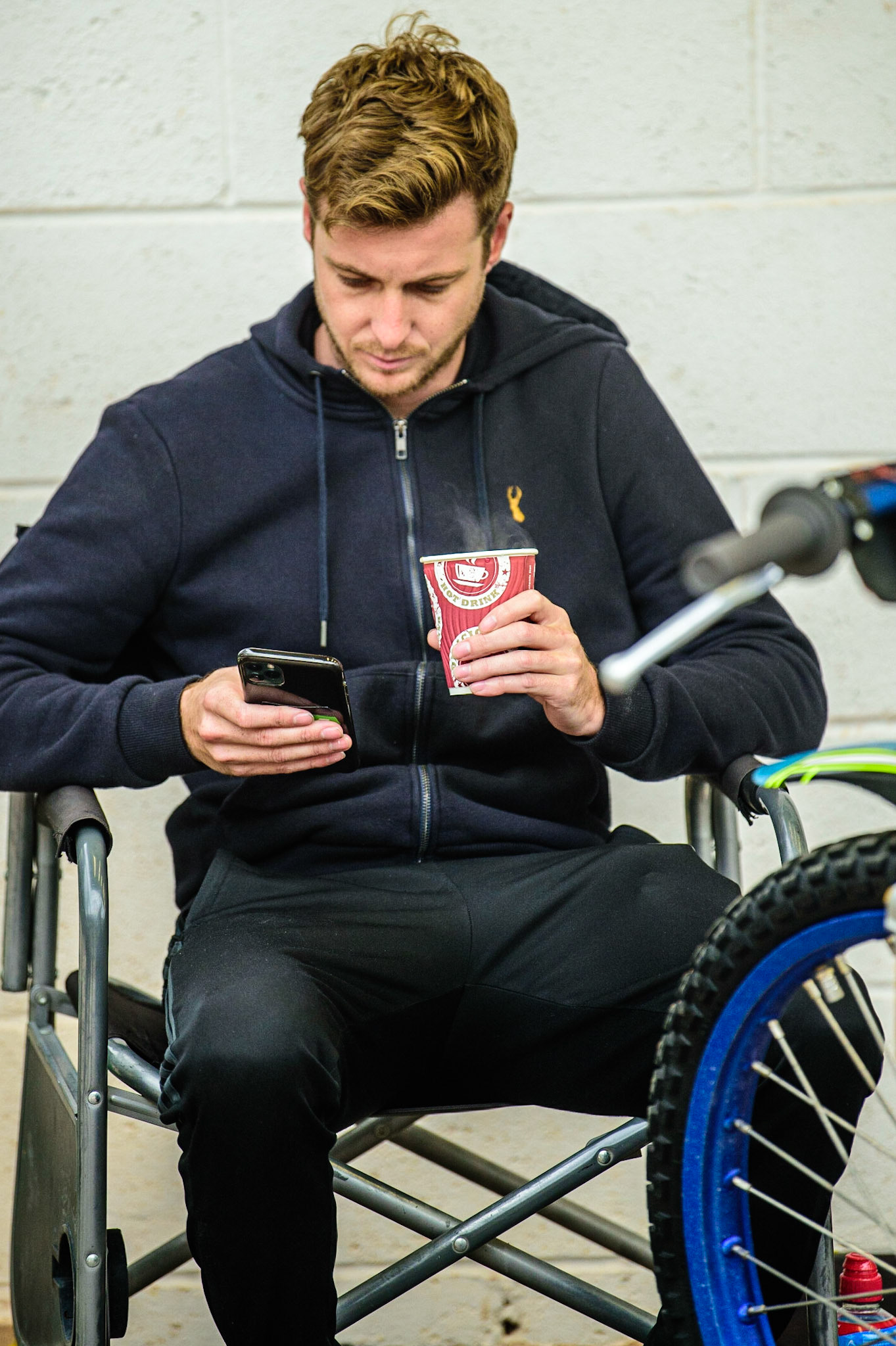 Parry's International Wolves injured rider Ryan Douglas in the pits with his team mates during the SGB Premiership match between Belle Vue Aces and Wolverhampton Wolves at the National Speedway Stadium, Manchester on Monday 29th August 2022. (Credit: Ian Charles | MI News)