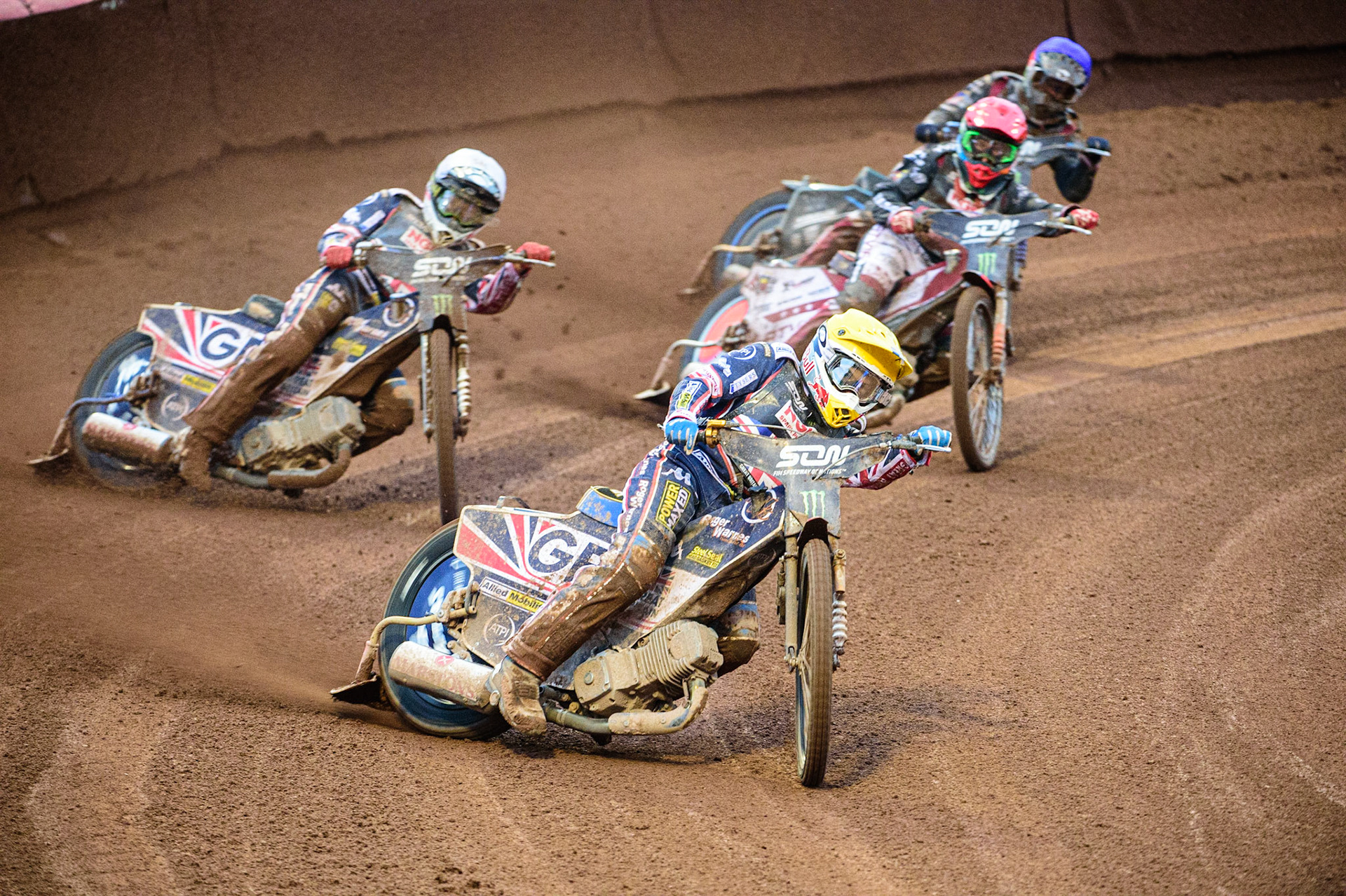 MANCHESTER, UK. OCT 17TH Robert Lambert of Great Britain (Yellow) leads Dan Bewley of Great Britain (White) Andzejs Lebedevs of Latvia (Red) and Olegs Mijailovs of Latvia (Blue) during the Monster Energy FIM Speedway of Nations at the National Speedway Stadium, Manchester on Sunday  17th October 2021. (Credit: Ian Charles | MI News)