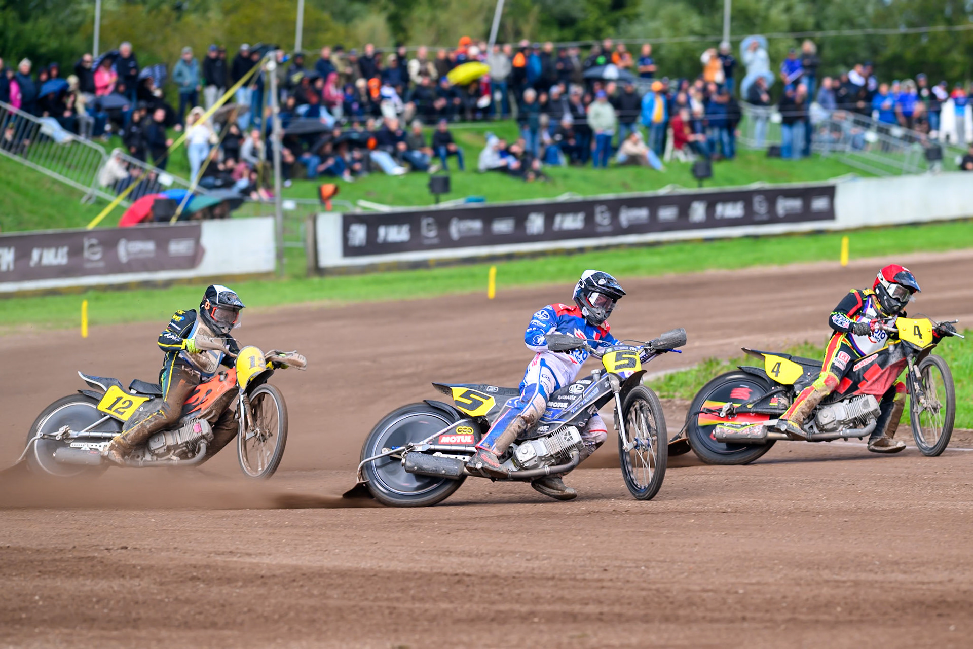 Tino Bouin (5) of France in White rides outside Mathias Tresarrieu (4) of France in Red  with Ossi Rantala (12) of Finland in Black &amp; White   behind during the FIM Long Track of Nations 2026 at the Speed Centre Roden in the Netherlands on Sunday 20th September 2026. (Photo: Ian Charles | MI News)