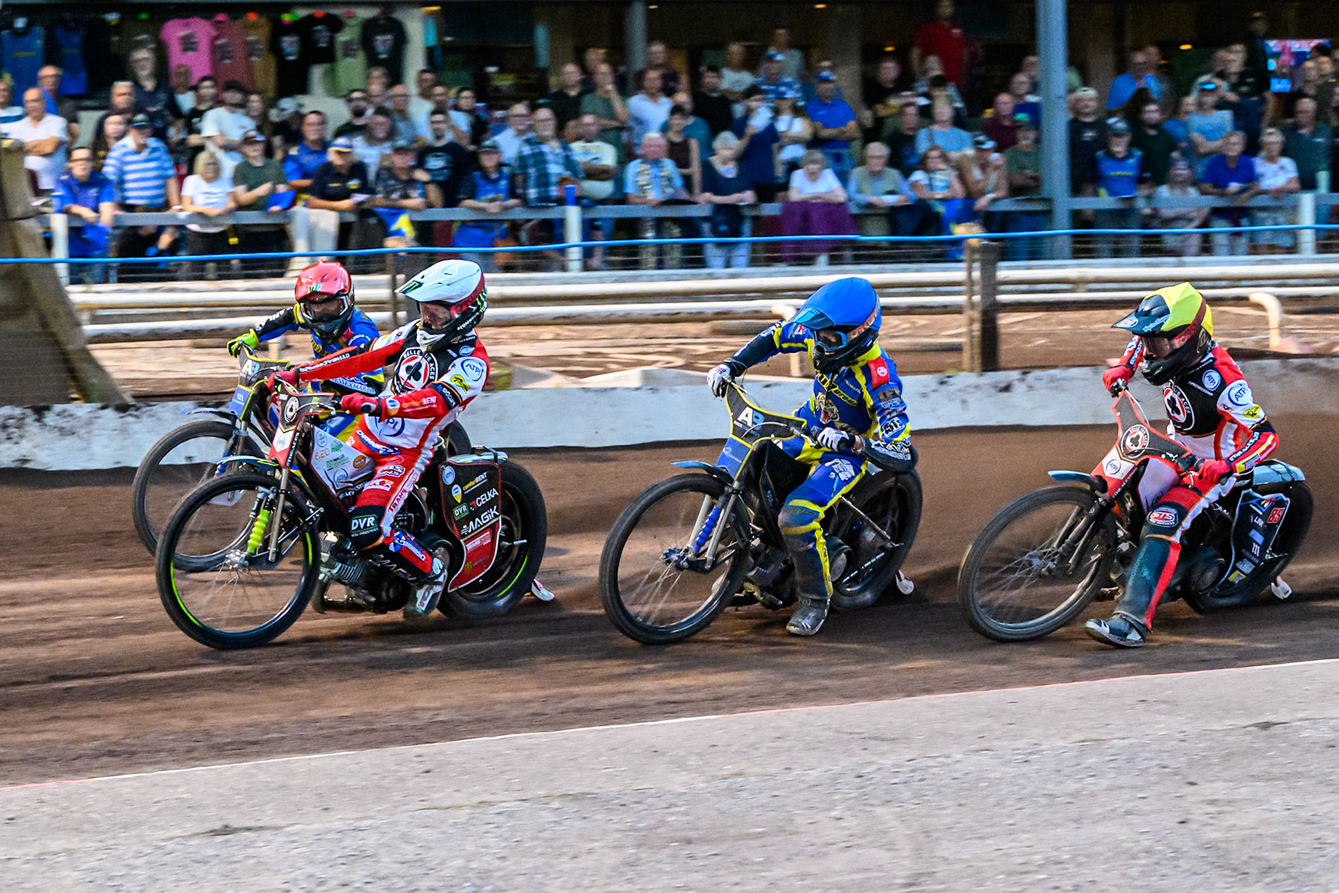 Jaimon Lidsey of Belle Vue Aces   leading Jack Holder of Sheffield Tigers  in Red, Anders Rowe of Sheffield Tigers  in Blue and Zach Cook of Belle Vue Aces   in Yellow during the Rowe Motor Oil Premiership match between Sheffield Tigers and Belle Vue Aces at Owlerton Stadium, Sheffield on Monday 11th August 2025. (Photo: Ian Charles | MI News)