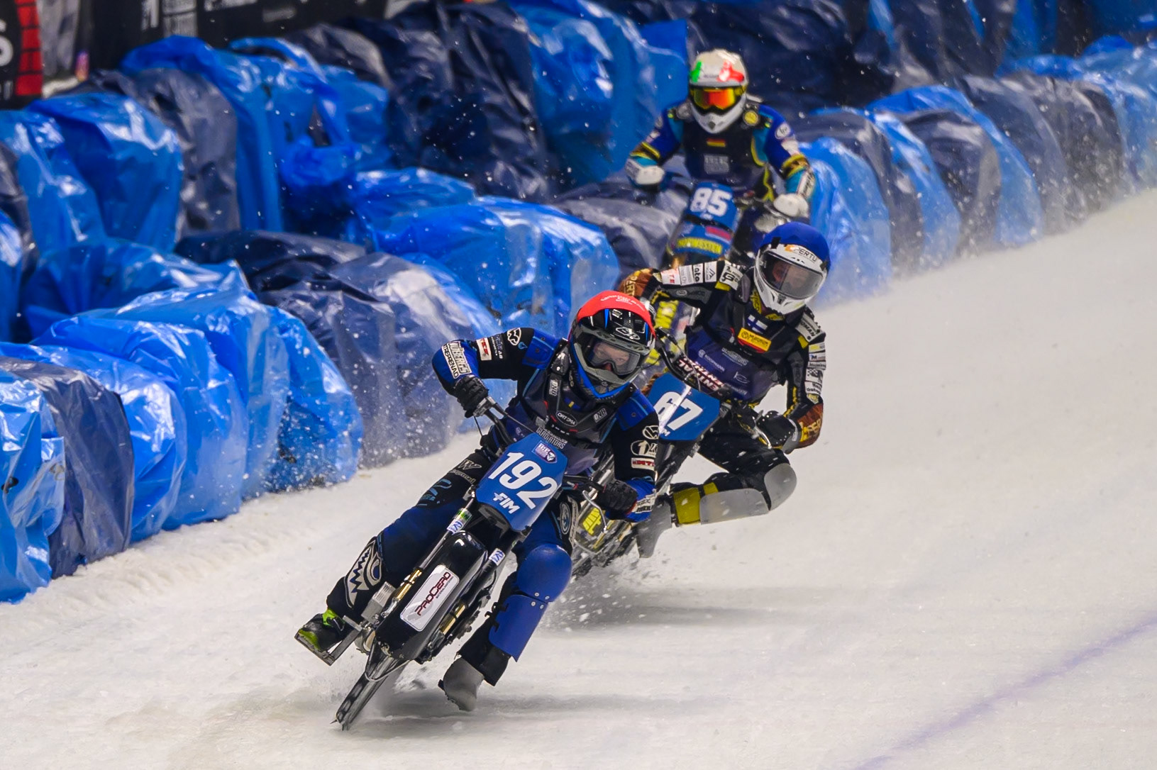 Niclas Svensson (192) of Sweden  in Red leading Heikki Huusko (67) of Finland  in Blue and Luca Bauer (85) of Italy/Germany  in White during the Ice Speedway Gladiators World Championship Final 1 at Max-Aicher-Arena, Inzell on Saturday 14th March 2026. (Photo: Ian Charles | MI News)