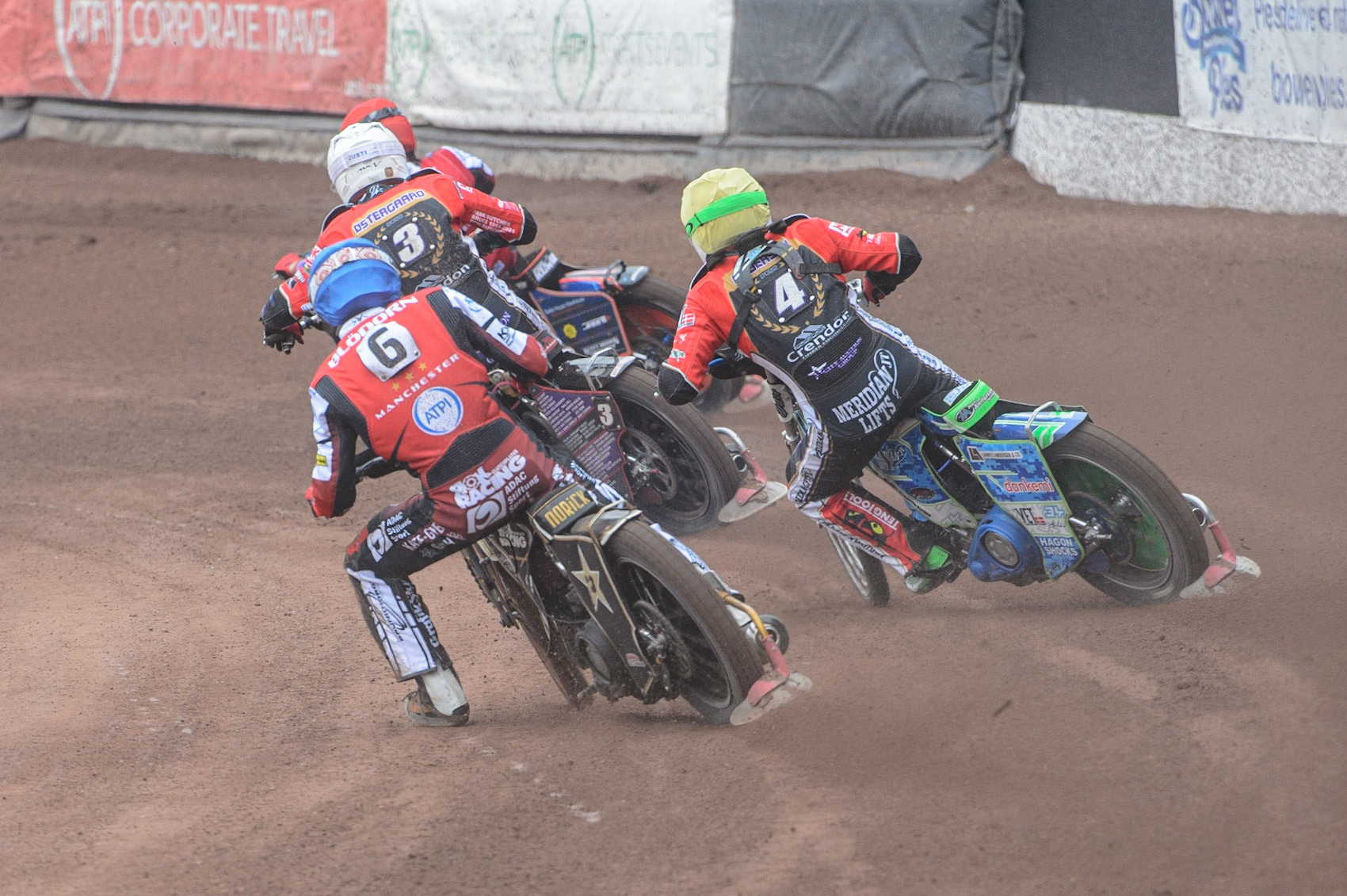 MANCHESTER, UK. MAY 2ND  Norick Blödorn  (Blue) chases Hans Andersen  (Yellow) and Ulrich Ostergaard  (White) during the SGB Premiership match between Belle Vue Aces and Peterborough at the National Speedway Stadium, Manchester on Monday 2nd May 2022. (Credit: Ian Charles | MI News)
