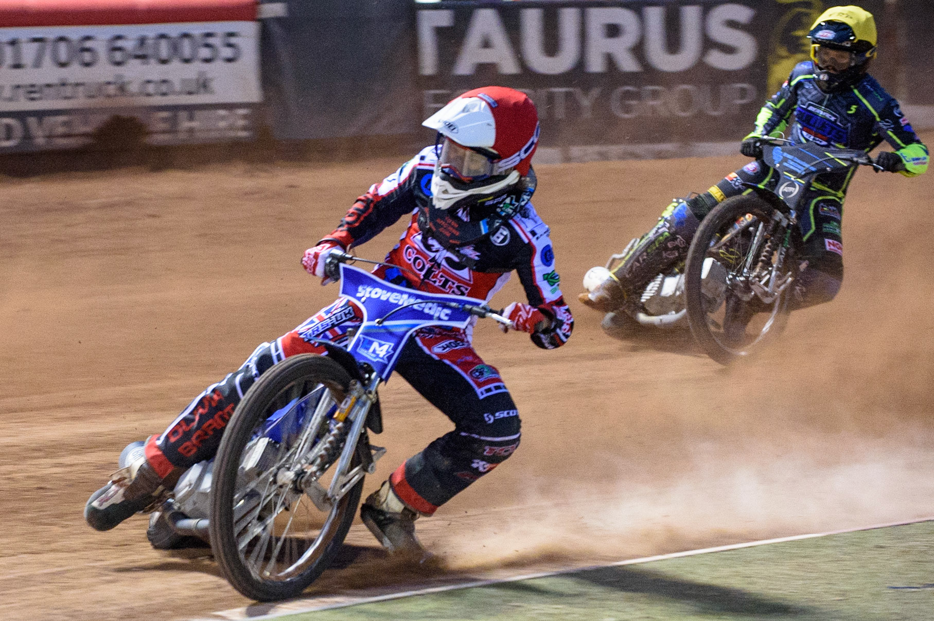 MANCHESTER, UK. MAY 28TH  Harry McGurk  (Red) leads Kyle Bickley   (Yellow) during the SGB National Development League match between Belle Vue Colts and Berwick Bullets at the National Speedway Stadium, Manchester on Friday 28th May 2021. (Credit: Ian Charles | MI News)