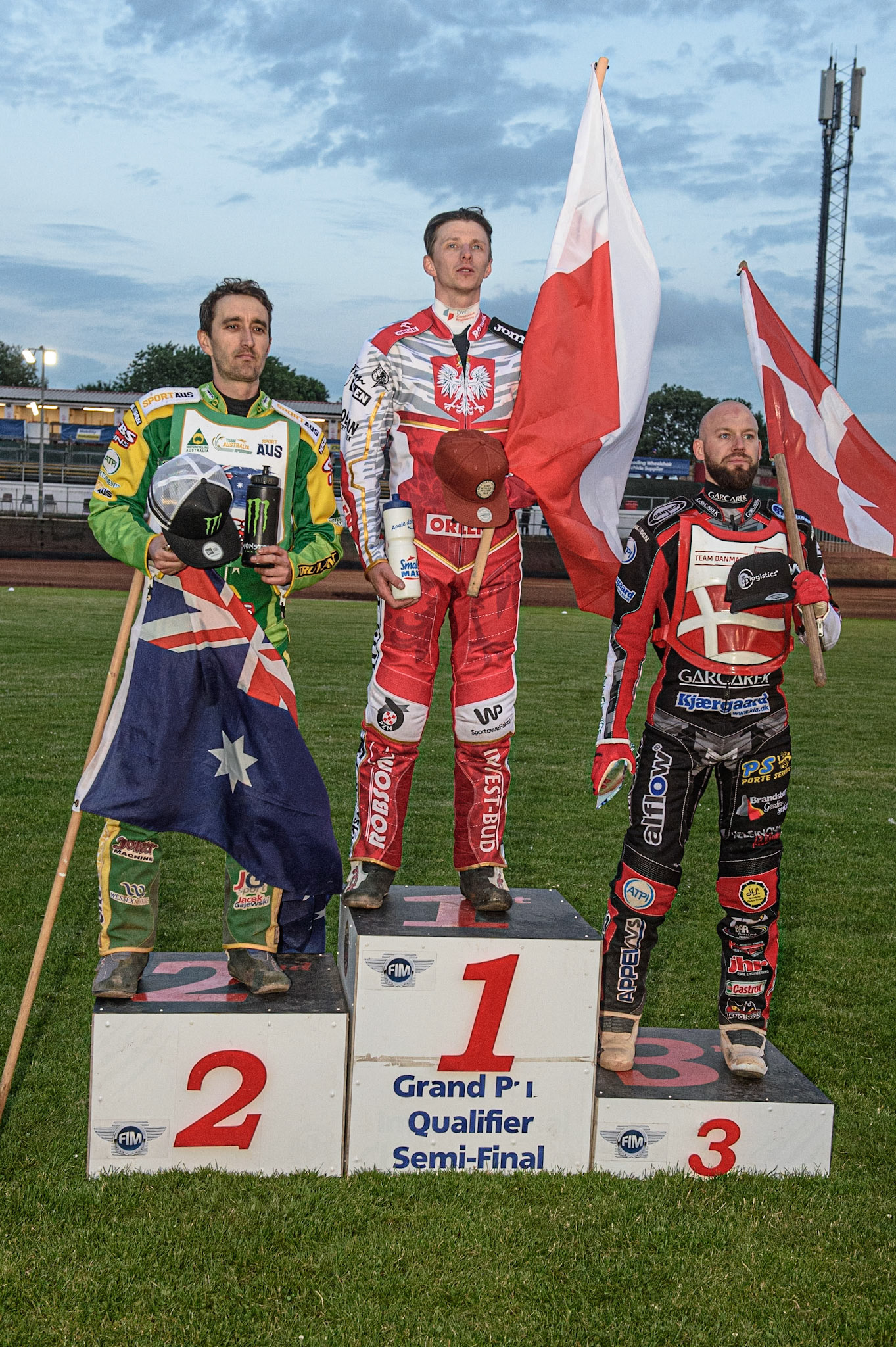 GLASGOW, UK. JUNE 19TH.  TOP 3 at Ashfield: (L-r) Chris Holder (Australia) (2nd), Tobiasz Musielak (Poland) (Winner), Nicolai Klindt (Denmark) (3rd)  during the FIM Speedway Grand Prix Qualifying Round at the Peugeot Ashfield Stadium, Glasgow on Saturday 19th June 2021. (Credit: Ian Charles | MI News)
