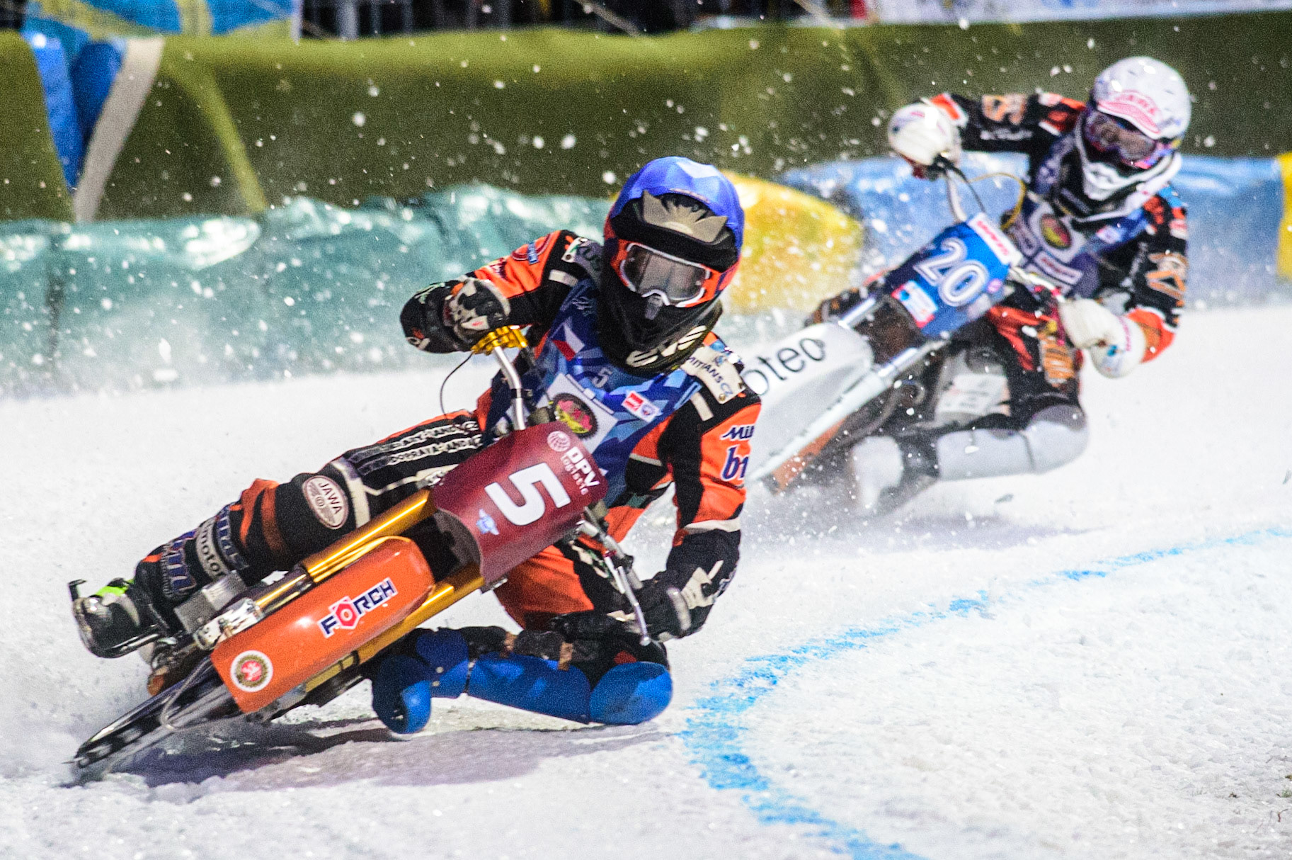 Lukas Hutla (Blue) leads Artturi Ervasti (White) during the German Individual Ice Speedway Championship at Horst-Dohm-Eisstadion, Berlin on Friday 3rd March 2023. (Photo: Ian Charles | MI News)