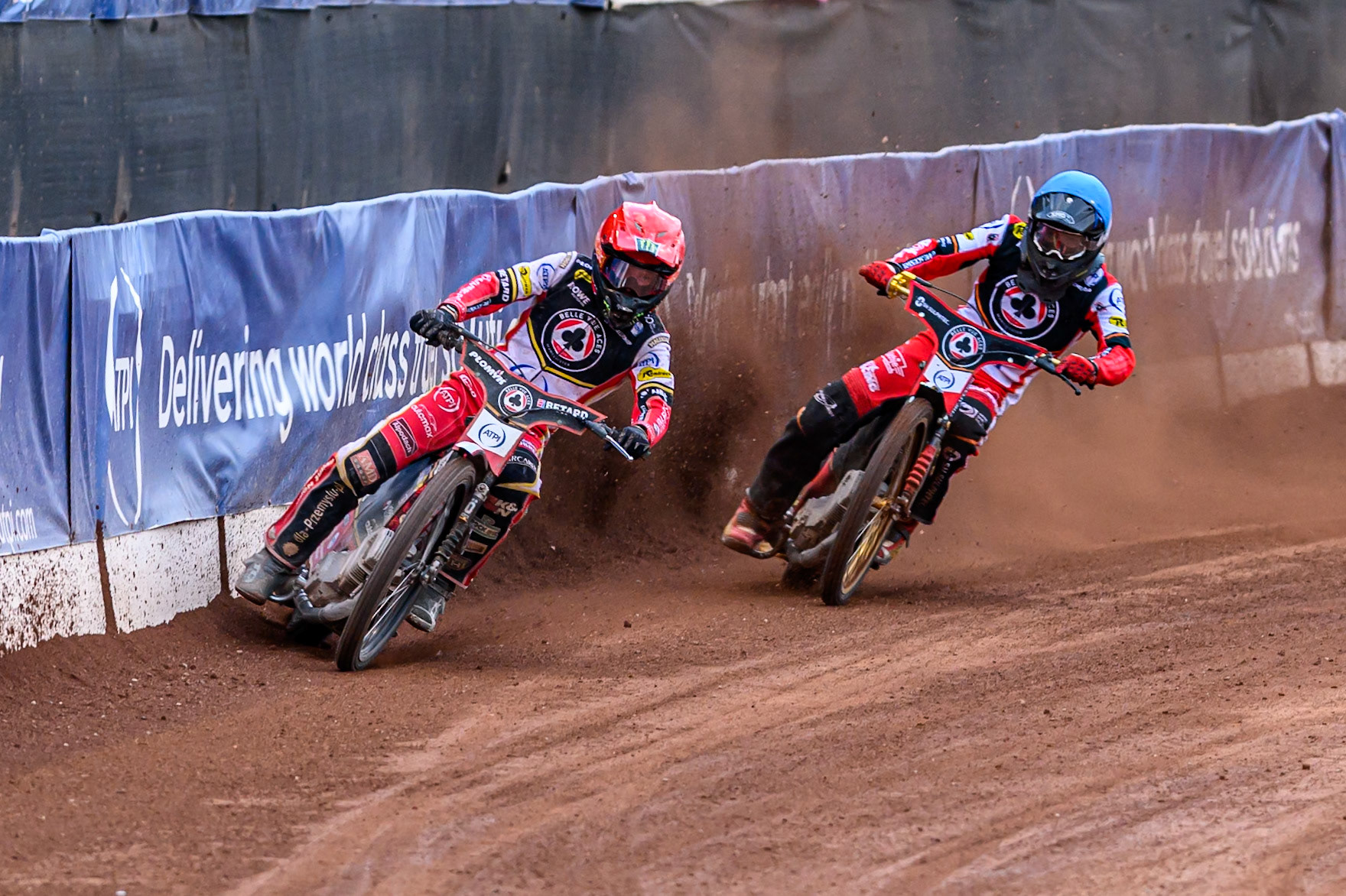 Belle Vue Aces' Dan Bewley in Red leading team mate Norick Blödorn in Blue during the Rowe Motor Oil Premiership match between Belle Vue Aces and King's Lynn Stars at the National Speedway Stadium, Manchester on Monday 23rd June 2025. (Photo: Ian Charles | MI News)