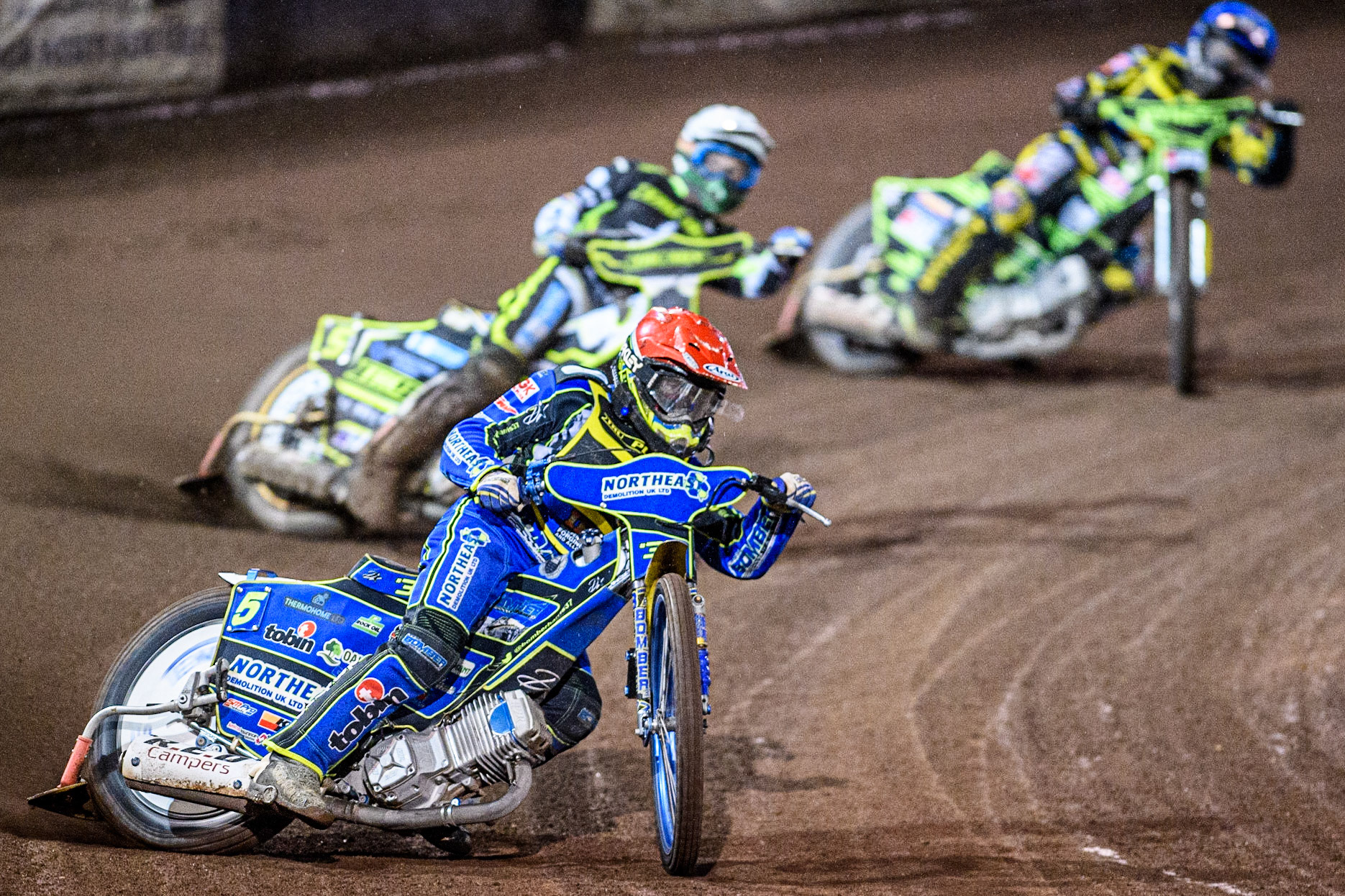 Chris Harris (Red) leads  Jason Doyle (White) and Jye Etheridge (Blue) during the Sports Insure Premiership Grand Final Second Leg match between Sheffield Tigers and Ipswich Witches at Owlerton Stadium, Sheffield on Thursday 5th October 2023. (Photo: Ian Charles | MI News)