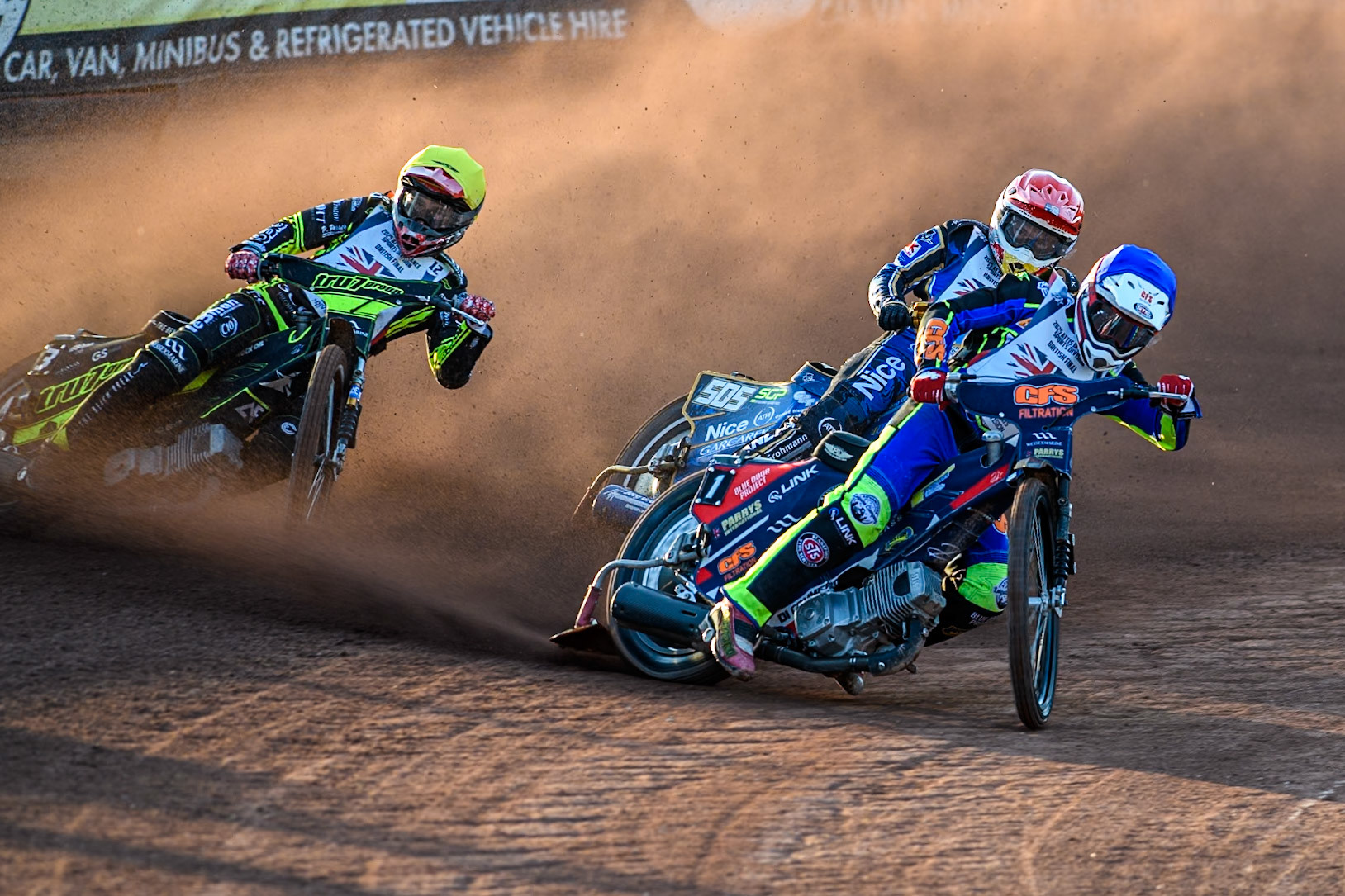 Steve Worrall in Blue leading Robert Lambert in Red with Adam Ellis’on the outside during the Attis Insurance Sports Division British Final at the National Speedway Stadium, Manchester on Monday 12th May 2025. (Photo: Ian Charles | MI News)