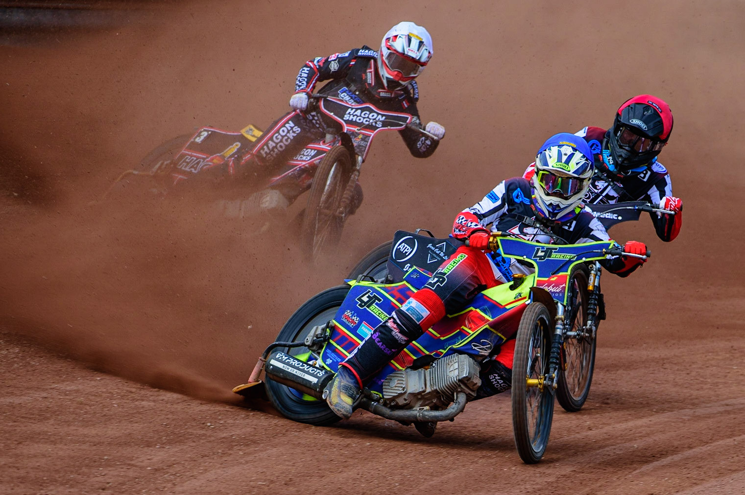 MANCHESTER, UK.  JUN 3RD  Nathan Ablitt  (Blue) leads team mate Harry McGurk  (Red) and Oxford’s Sam Hagon  (White) during the National Development League match between Belle Vue Colts and Oxford Chargers at the National Speedway Stadium, Manchester on Friday 3rd June 2022. (Credit: Ian Charles | MI News)
