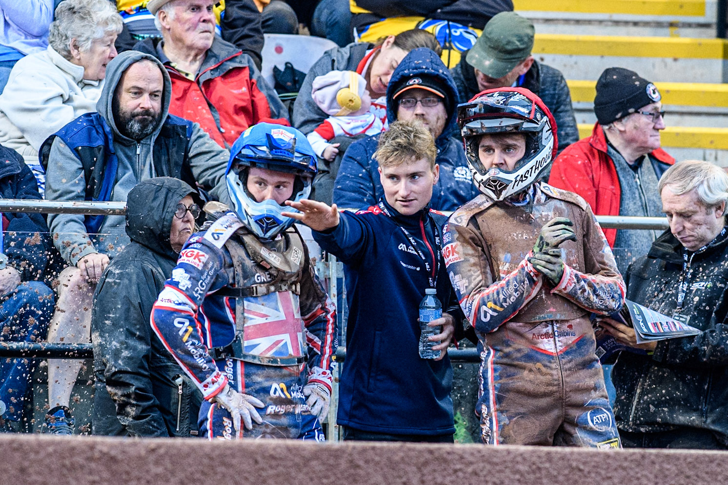 Tom Brennan (Centre) gives some advice to Leon Flint of Great Britain (Left) and Dan Thompson of Great Britain (Right) during the Monster Energy FIM Speedway of Nations 2 (Under 21) Final at the National Speedway Stadium, Manchester on Friday 12th July 2024. (Photo: Ian Charles | MI News)