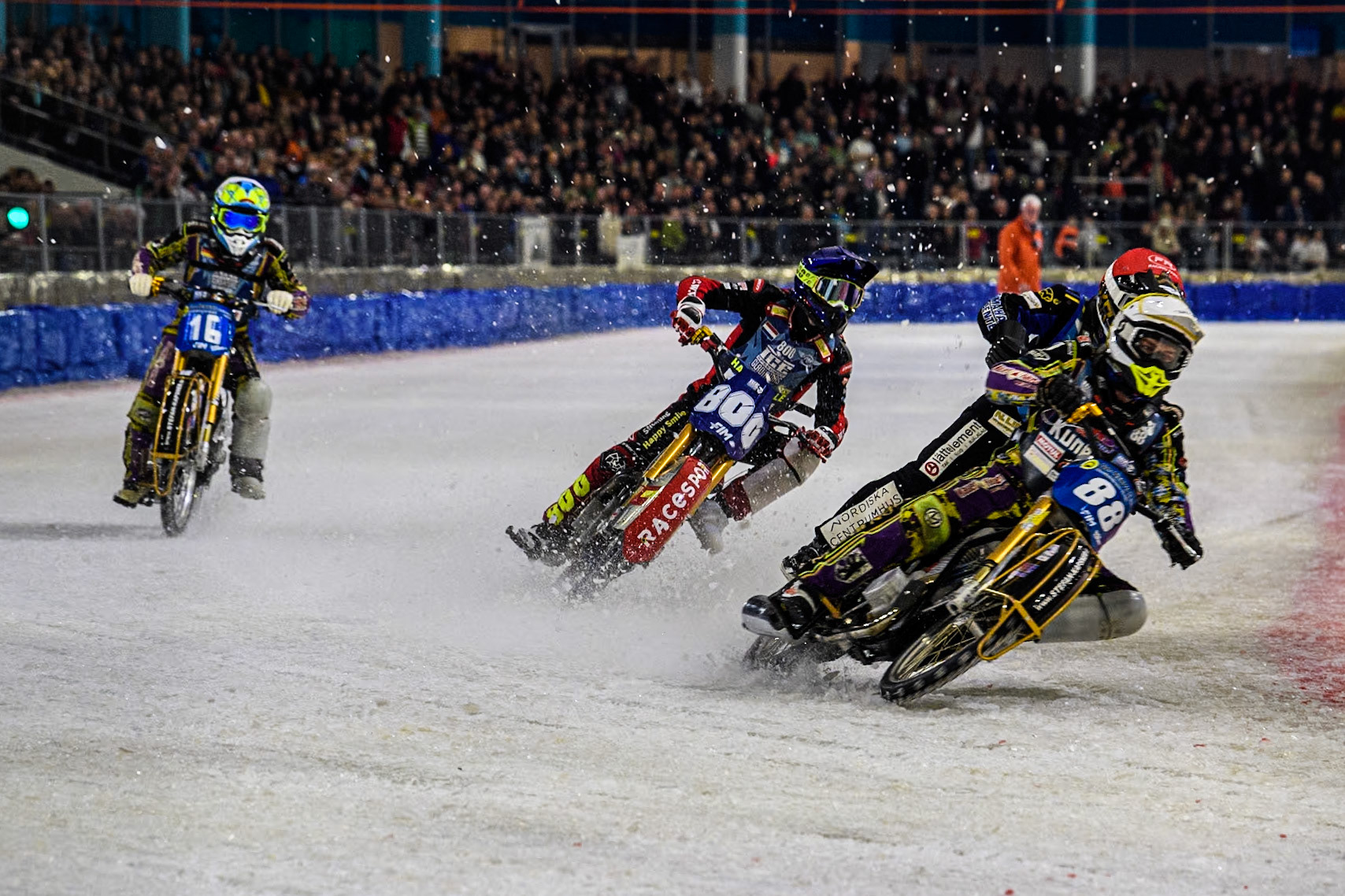 Germany's Max Niedermaier (88) in Yellow leading Sweden's Martin Haarahiltunen (199)  in Red, Netherlands' Jasper Iwema (800) in Blue and Germany's Maximillian Neidermaier (16) in White during the FIM Ice Speedway Gladiators World Championship Final 3 at Ice Rink Thialf, Heerenveen on Saturday 6th April 2024. (Photo: Ian Charles | MI News)