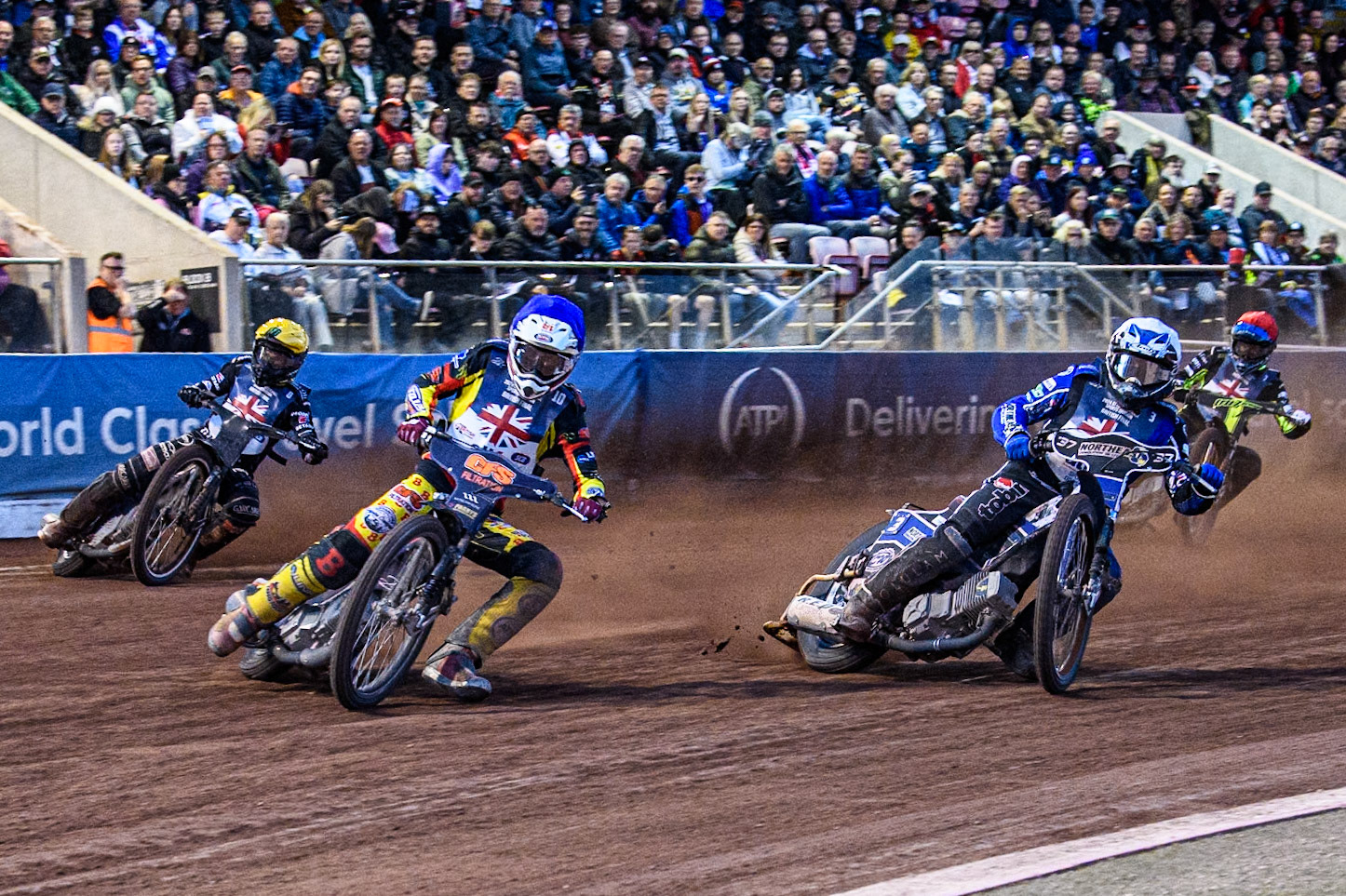 The Semi Final: Steve Worrall in Blue leading Chris Harris in White, Tai Woffinden in Yellow and  Adam Ellis in Red during the Attis Insurance Sports Division British Speedway Championship Final at the National Speedway Stadium, Manchester on Saturday 8th June 2024. (Photo: Ian Charles | MI News)