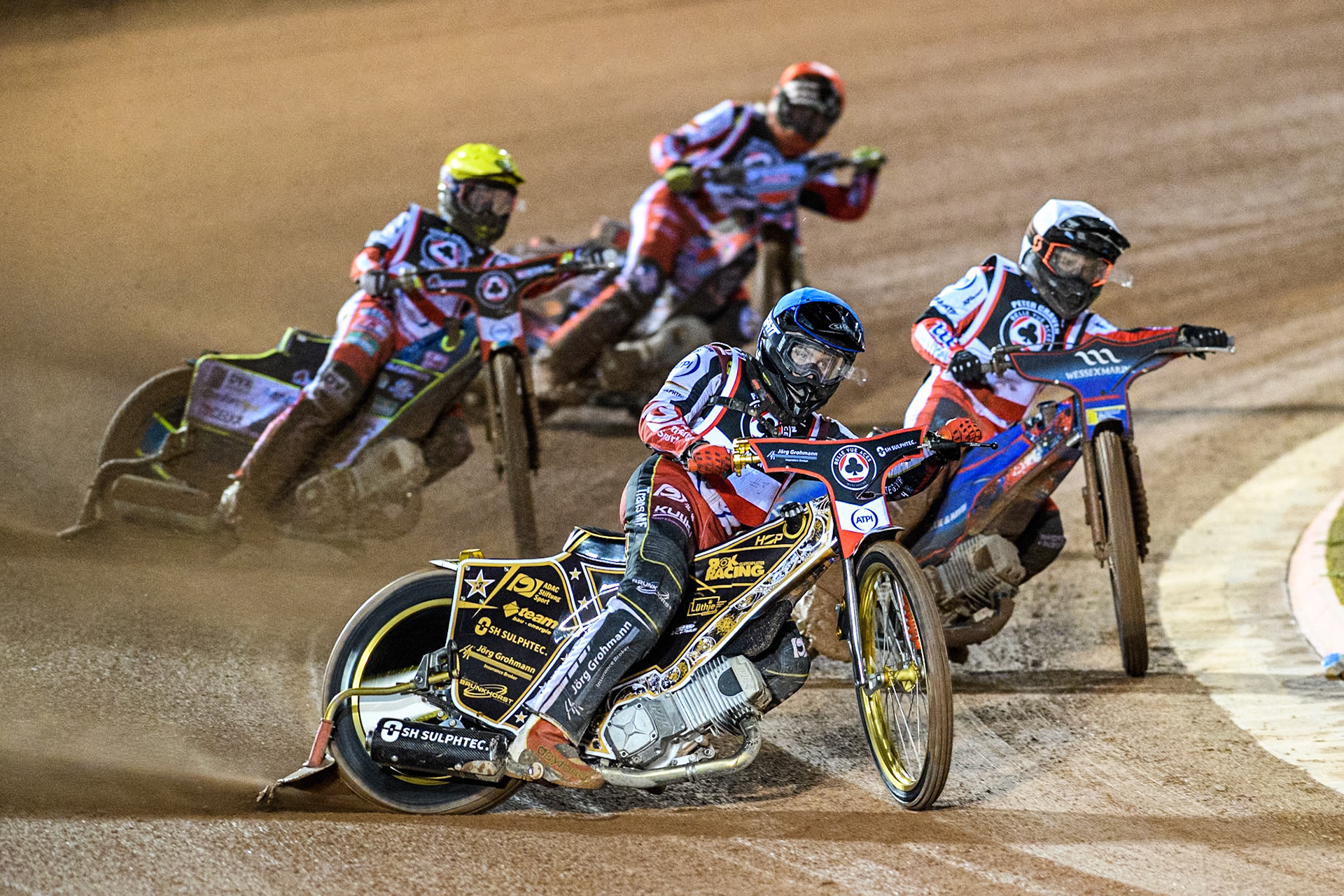 Germany's Norick Blödorn (Blue) leads  Australia's Ben Cook (White), England's Connor Bailey (Red) and Australia's Jaimon Lidsey (Yellow) during the Peter Craven Memorial Trophy meeting at the National Speedway Stadium, Manchester on Monday 18th March 2024. (Photo: Ian Charles | MI News)