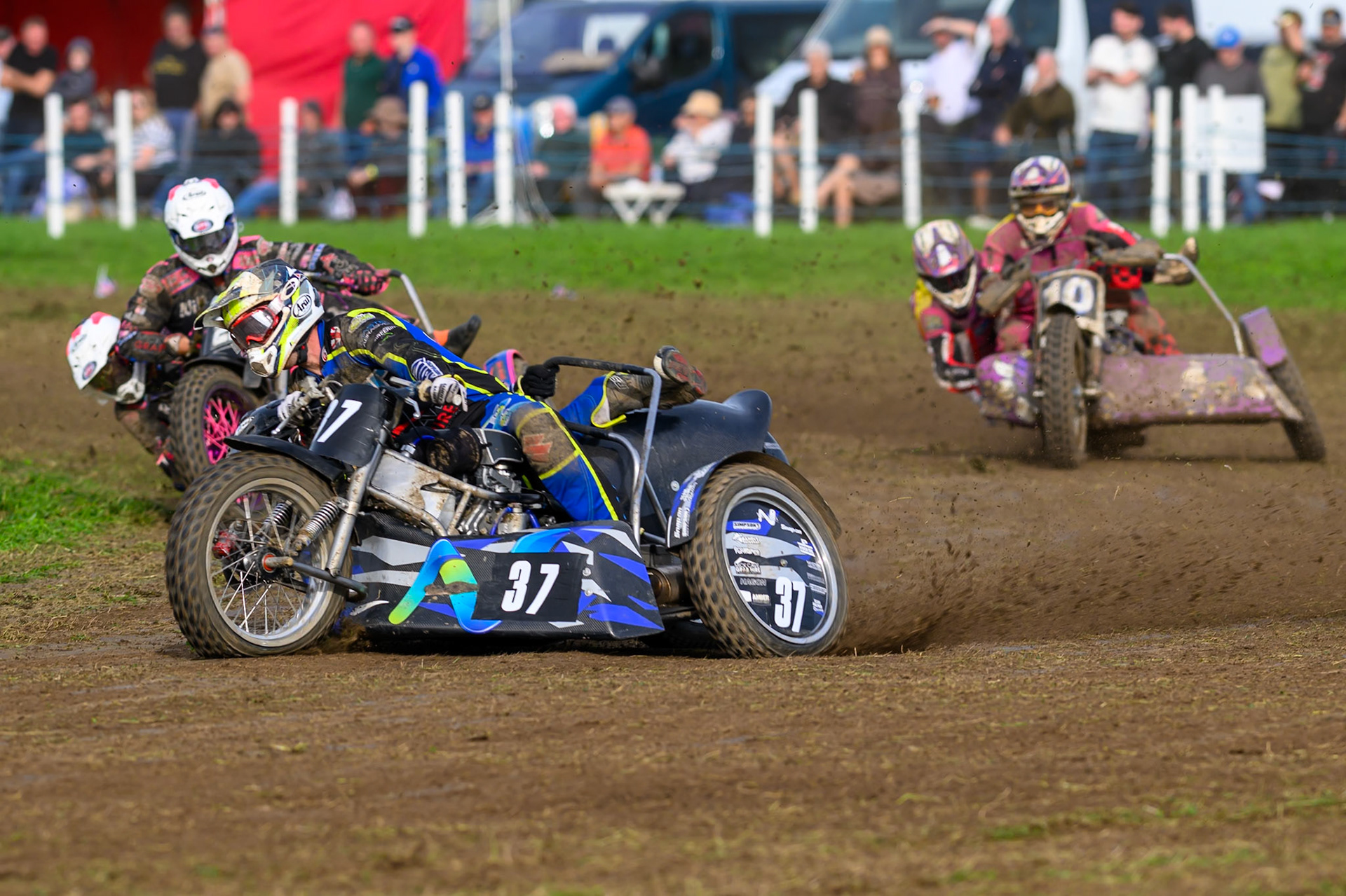 British Masters 1000cc Sidecars: Mark Cossar/Wayne Rickards (37)  leading Colin Blackbourn/Carl Pugh (25) and Clint Blondell/Lewis Davies (10) during the British Masters Grasstrack Championship at Lower Marsh Farm, Much Hoole, Preston in Lancashire, England on Sunday 13th September 2026. (Photo: Ian Charles | MI News)