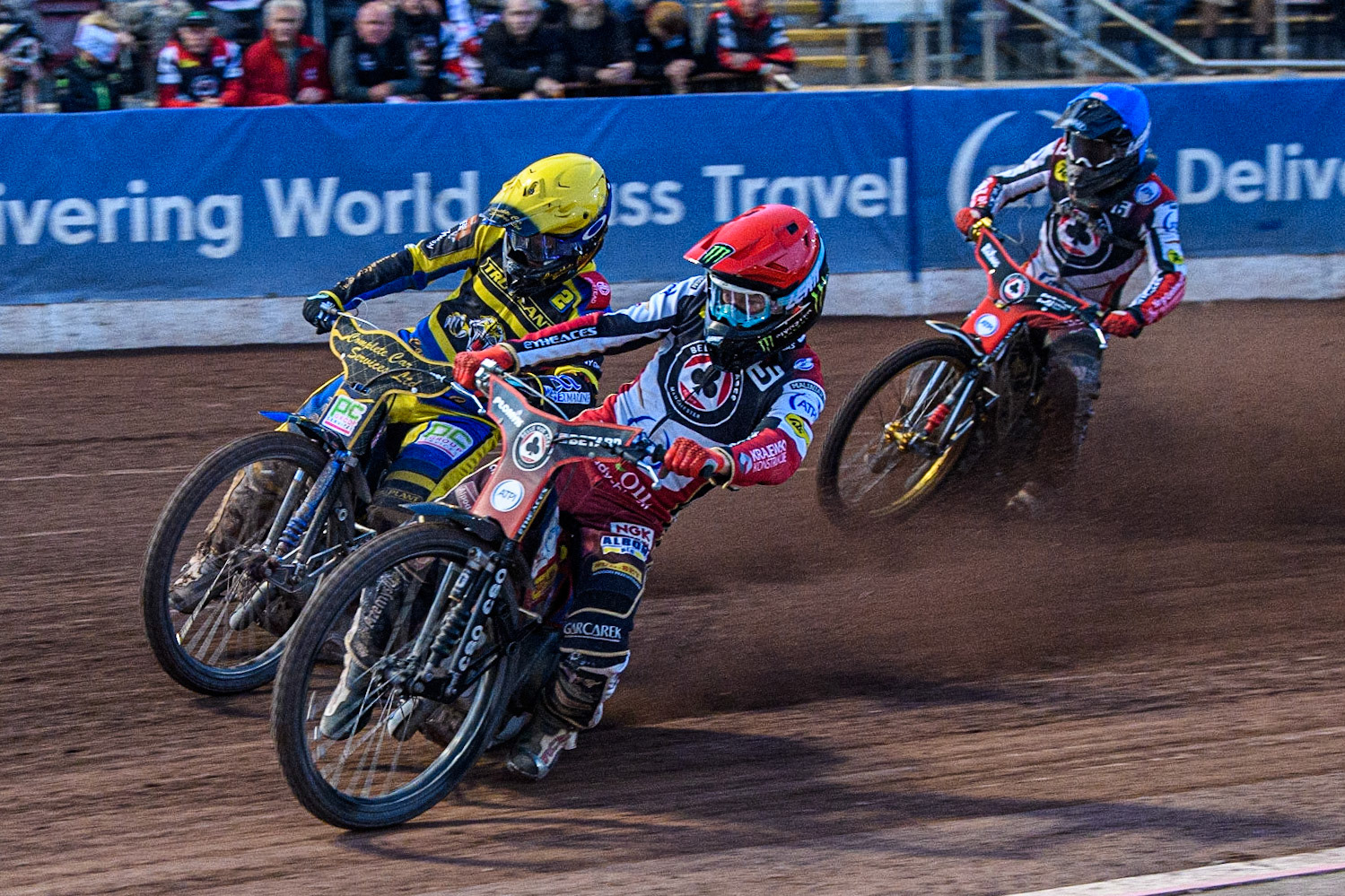 Dan Bewley (Red) inside Kyle Howarth (Yellow) with Norick Blodorn (Blue) behind during the Sports Insure Premiership match between Belle Vue Aces and Sheffield Tigers at the National Speedway Stadium, Manchester on Monday 7th August 2023. (Photo: Ian Charles | MI News)