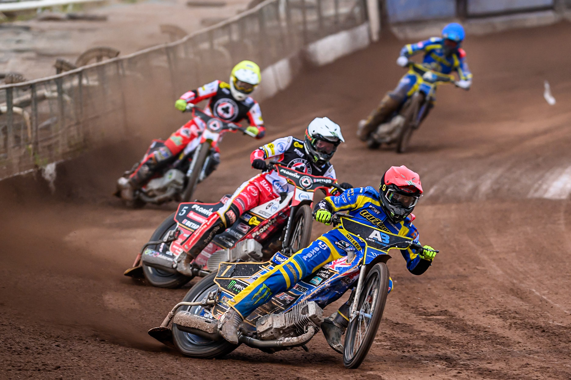 Jack Holder of Sheffield Tigers  in Red leading Dan Bewley of Belle Vue Aces   in White, Tate Zischke of Belle Vue Aces   in Yellow and Anders Rowe of Sheffield Tigers  in Blue during the Rowe Motor Oil Premiership match between Sheffield Tigers and Belle Vue Aces at Owlerton Stadium, Sheffield on Monday 11th August 2025. (Photo: Ian Charles | MI News)