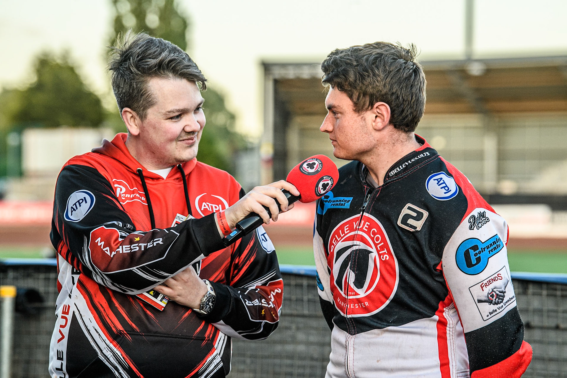 Belle Vue roving reporter Lee Wild (Left) interviews Belle Vue Colts' Chad Wirtzfeld during the WSRA National Development League match between Belle Vue Colts and Middlesbrough Tigers at the National Speedway Stadium, Manchester on Monday 17th June 2024. (Photo: Ian Charles | MI News)