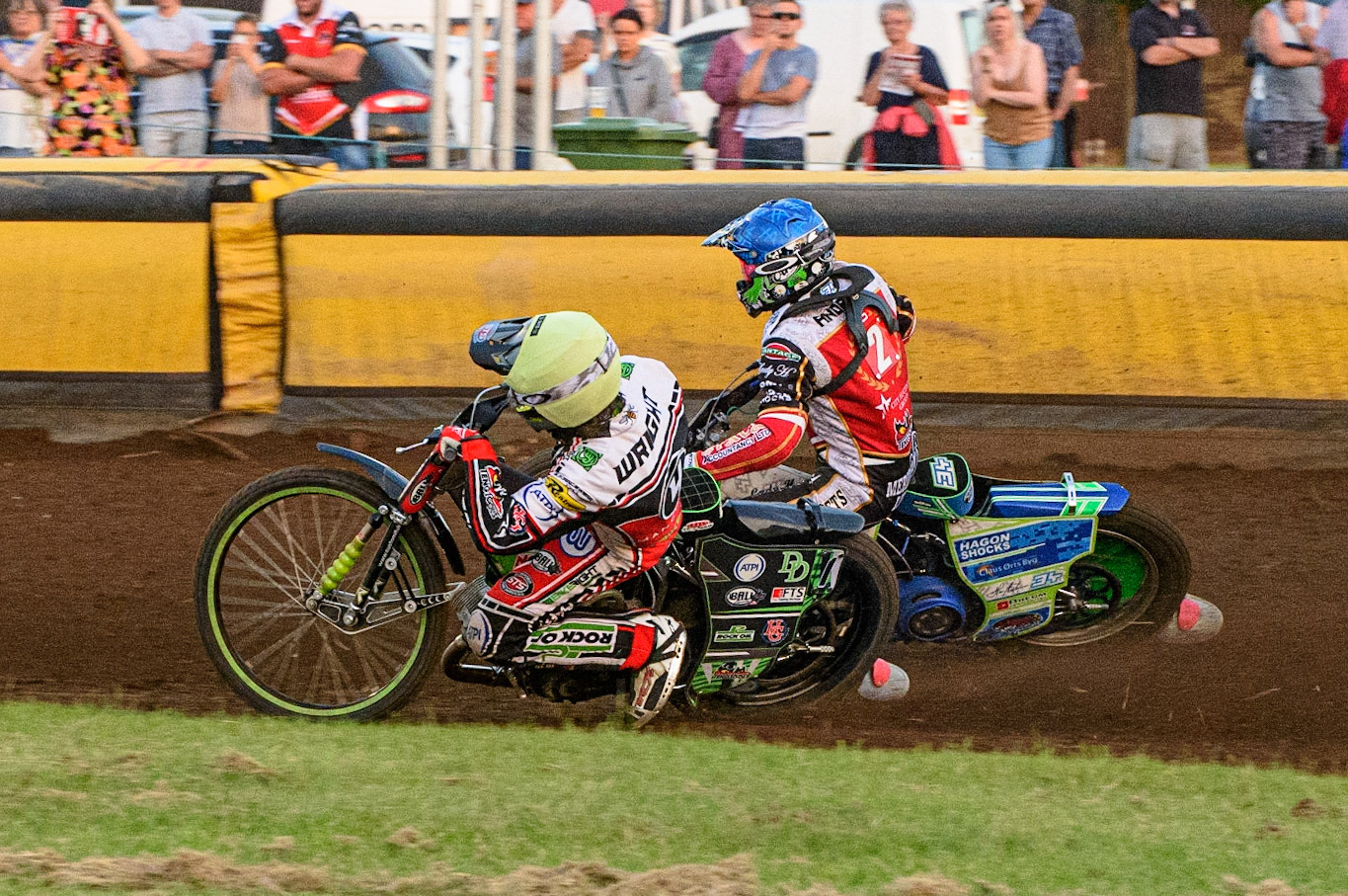 PETERBOROUGH, UK. JULY 19TH   Charles Wright  (Yellow) forces his way past Hans Andersen (Blue) to help the Aces to a Maximum Points heat win during the SGB Premiership match between Peterborough and Belle Vue Aces at East of England Showground, Peterborough on Monday 19th July 2021. (Credit: Ian Charles | MI News)