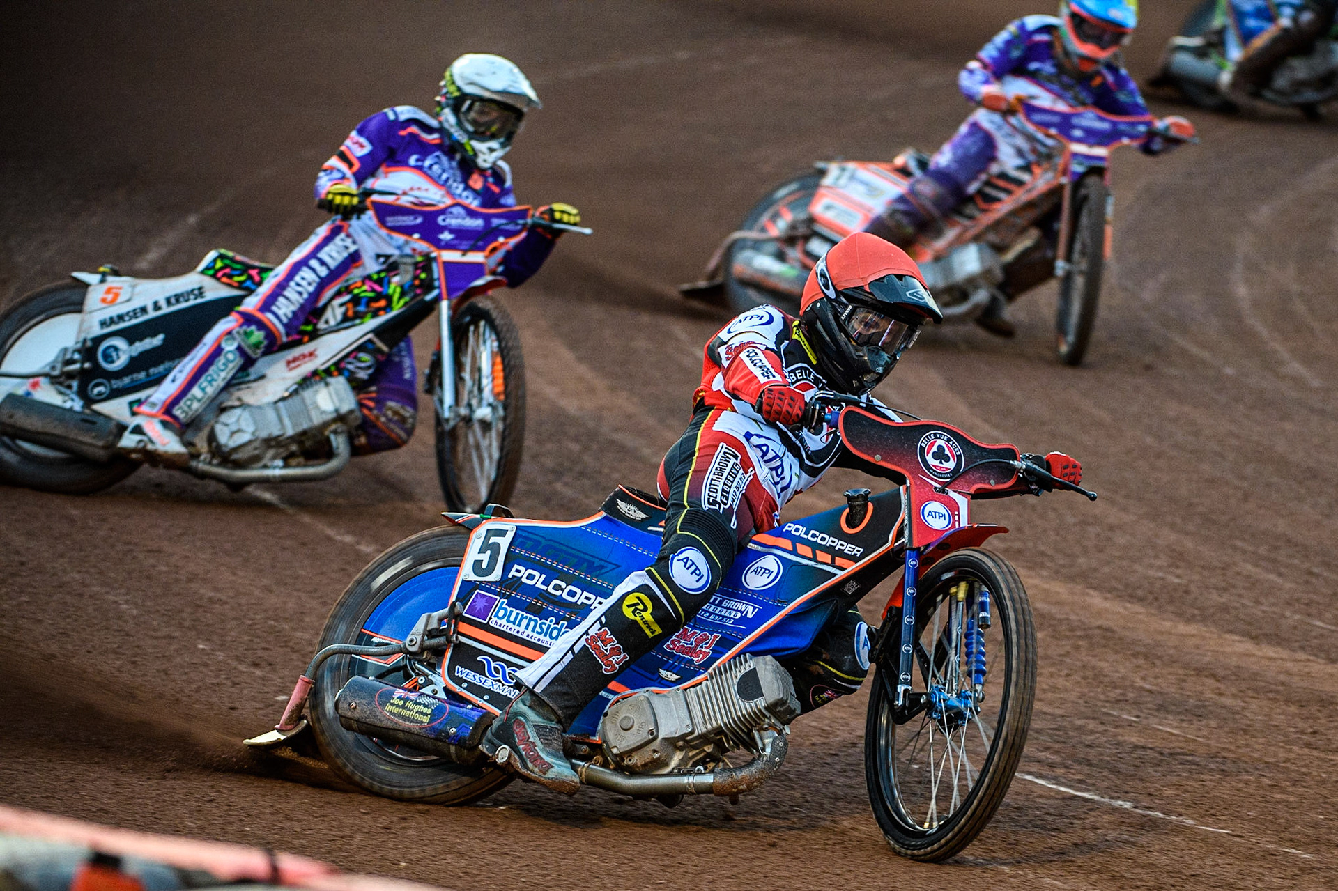 Brady Kurtz  (Red) leads Niels-Kristian Iversen  (White) and Jordan Jenkins  (Yellow) during the SGB Premiership match between Belle Vue Aces and Peterborough at the National Speedway Stadium, Manchester on Monday 24th April 2023. (Photo: Ian Charles | MI News)