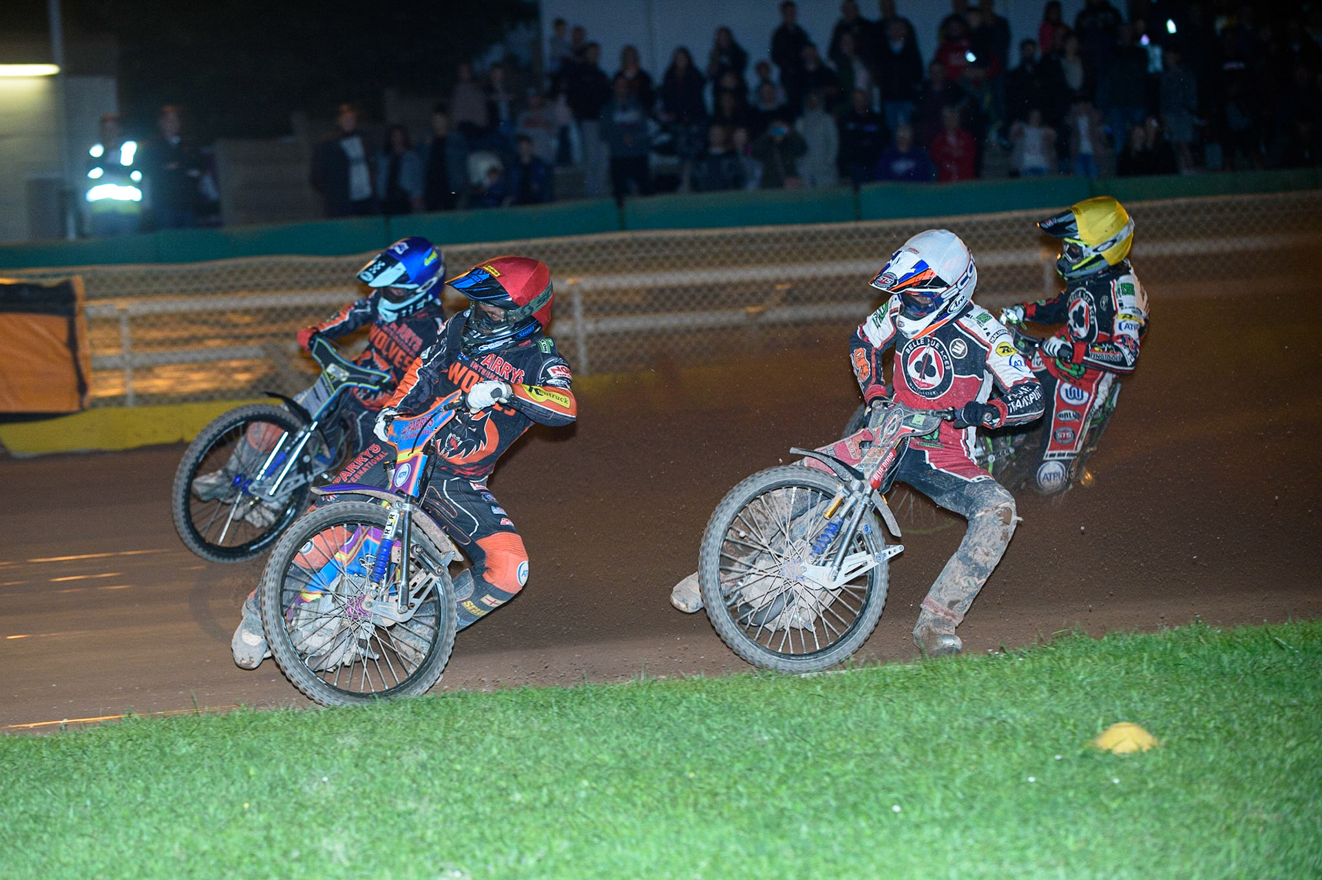 WOLVERHAMPTON, UK. AUGUST 30TH. Rory Schlein  (Red) and Ryan Douglas  (Blue) lead Steve Worrall  (White) and Charles Wright  (Yellow)during the SGB Premiership match between Wolverhampton Wolves and Belle Vue Aces at Monmore Green Stadium, Wolverhampton on Monday 30th August 2021. (Credit: Ian Charles | MI News)