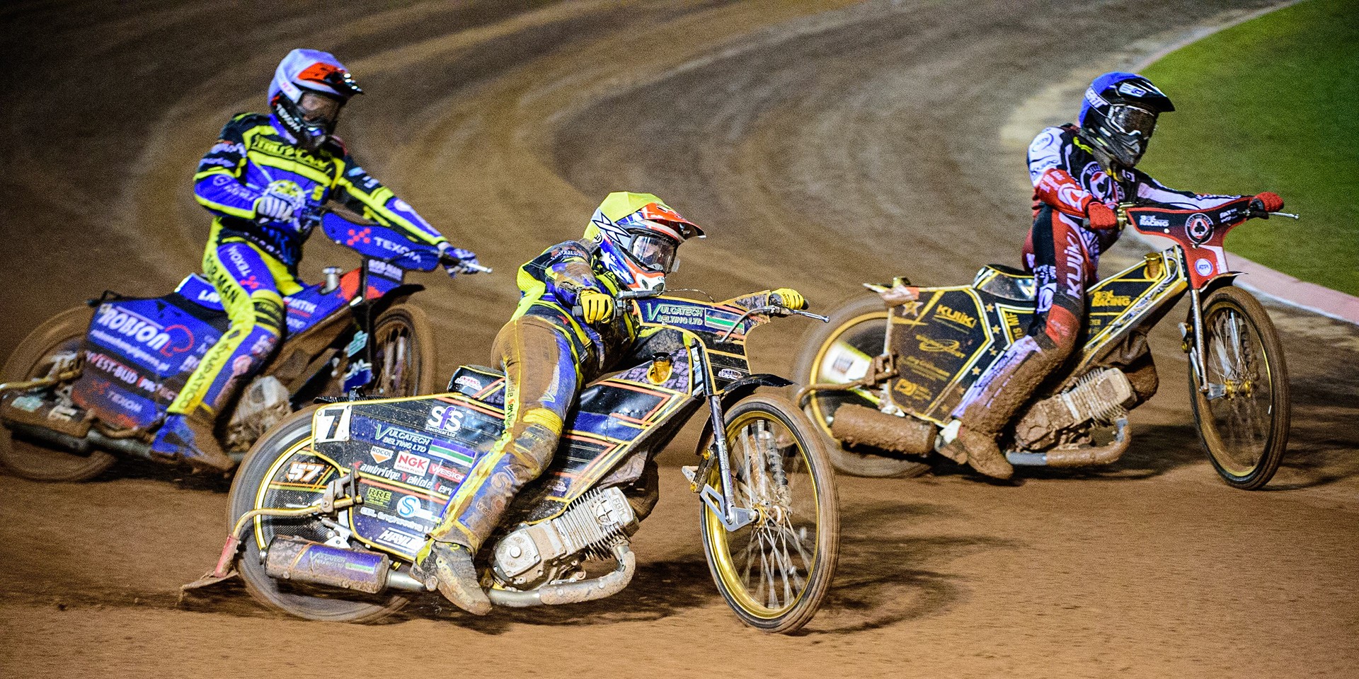 Connor Mountain  (Yellow) outside Norick Blödorn  (Blue) with Tobiasz Musielak  (White) behind during the SGB Premiership Grand Final 1st leg between Belle Vue Aces and Sheffield Tigers at the National Speedway Stadium, Manchester on Monday 10th October 2022. (Credit: Ian Charles | MI News)