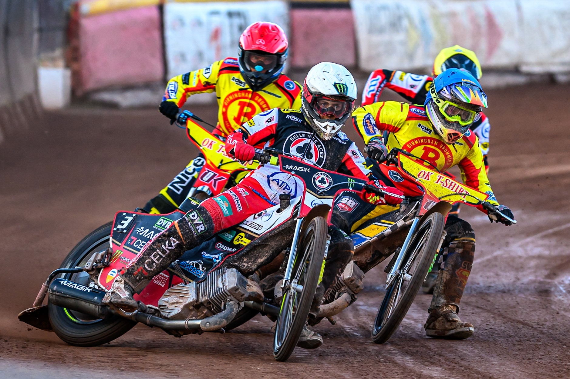 Belle Vue Aces' Jaimon Lidsey  in White leading Birmingham Brummies' Ben Barker  in Blue, Birmingham Brummies' Matej Zagar  in Red and Belle Vue Aces' Zach Cook  in Yellow during the Rowe Motor Oil Premiership match between Birmingham Brummies and Belle Vue Aces at Perry Barr Stadium, Birmingham on Monday 28th July 2025. (Photo: Ian Charles | MI News)
