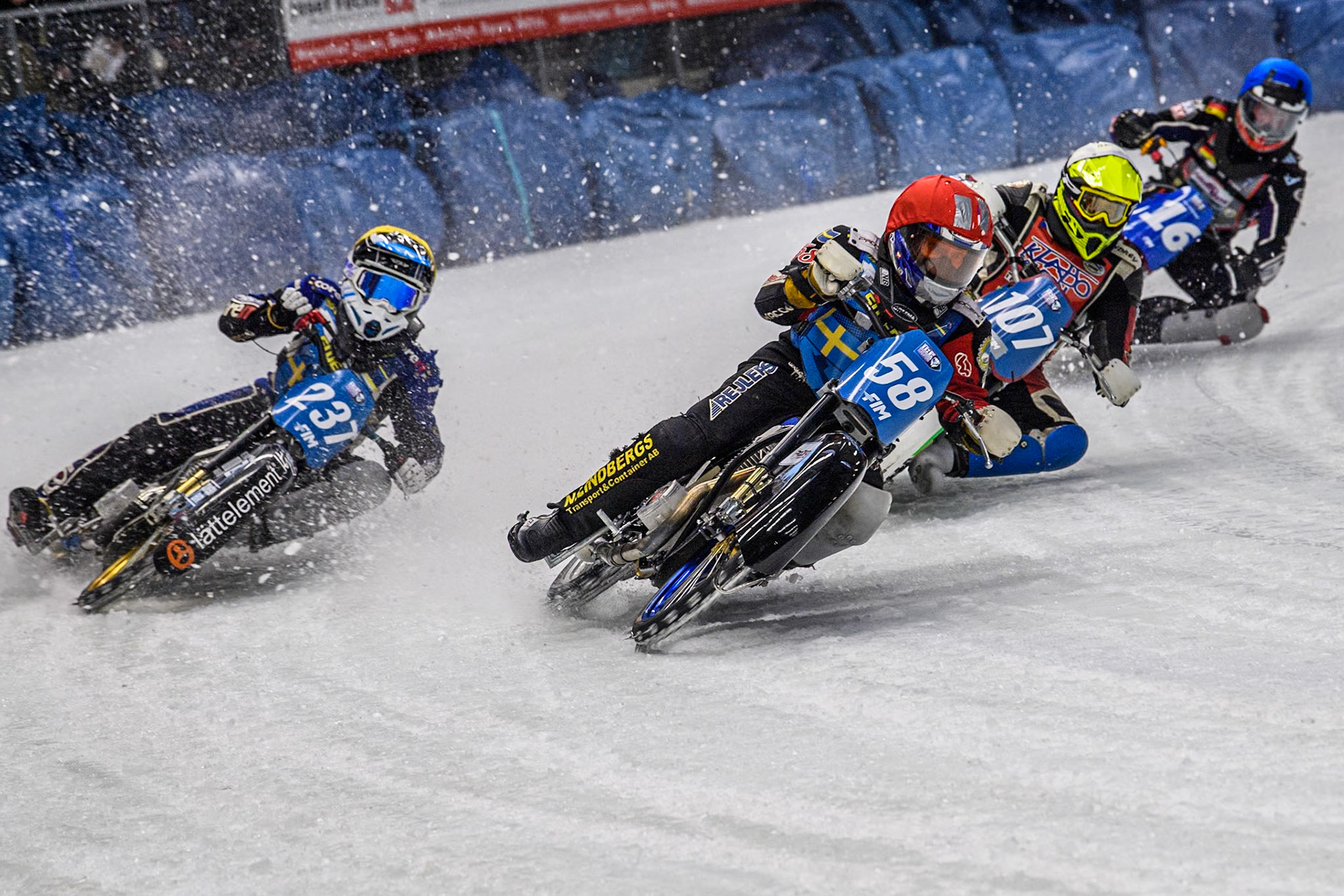 Sweden's Stefan Svensson (58) (Red) leads  Sweden's Jimmy Hörnell Lidfalk (237) (Yellow) Czech Republic's Andrej Diviš (107) (White) and Germany's Benedikt Monn (16) (Blue) during the FIM Ice Speedway Gladiators World Championship Final 2 at the Max-Aicher-Arena, Inzell on Sunday 24 March 2024. (Photo: Ian Charles | MI News)