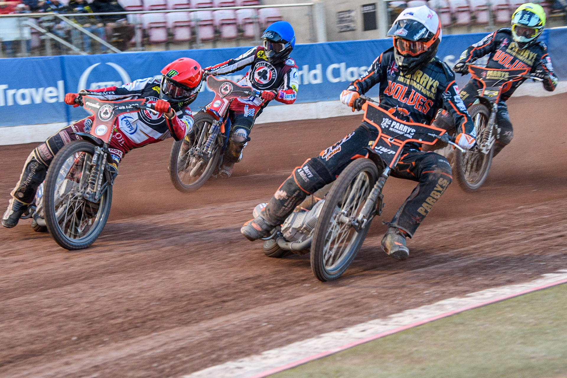 Sam Masters (White) inside Dan Bewley (Red) with Brady Kurtz (Blue) and Ryan Douglas (Yellow) behind during the Sports Insure Premiership match between Belle Vue Aces and Wolverhampton Wolves at the National Speedway Stadium, Manchester on Monday 3rd July 2023. (Photo: Ian Charles | MI News)