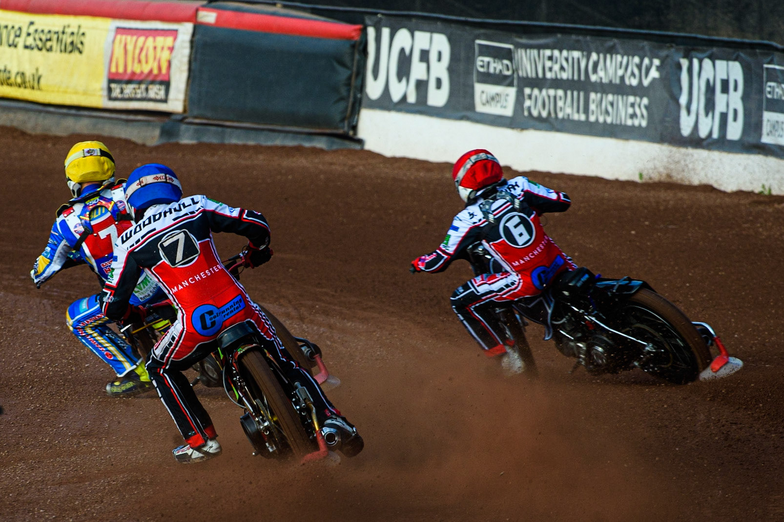 MANCHESTER, UK. JULY 23RD Ben Woodhull  (Blue) chases Sam McGurk (Red) and Nathan Ablitt  (Yellow) during the National Development League match between Belle Vue Colts and Eastbourne Seagulls at the National Speedway Stadium, Manchester on Friday 23rd July 2021. (Credit: Ian Charles | MI News)