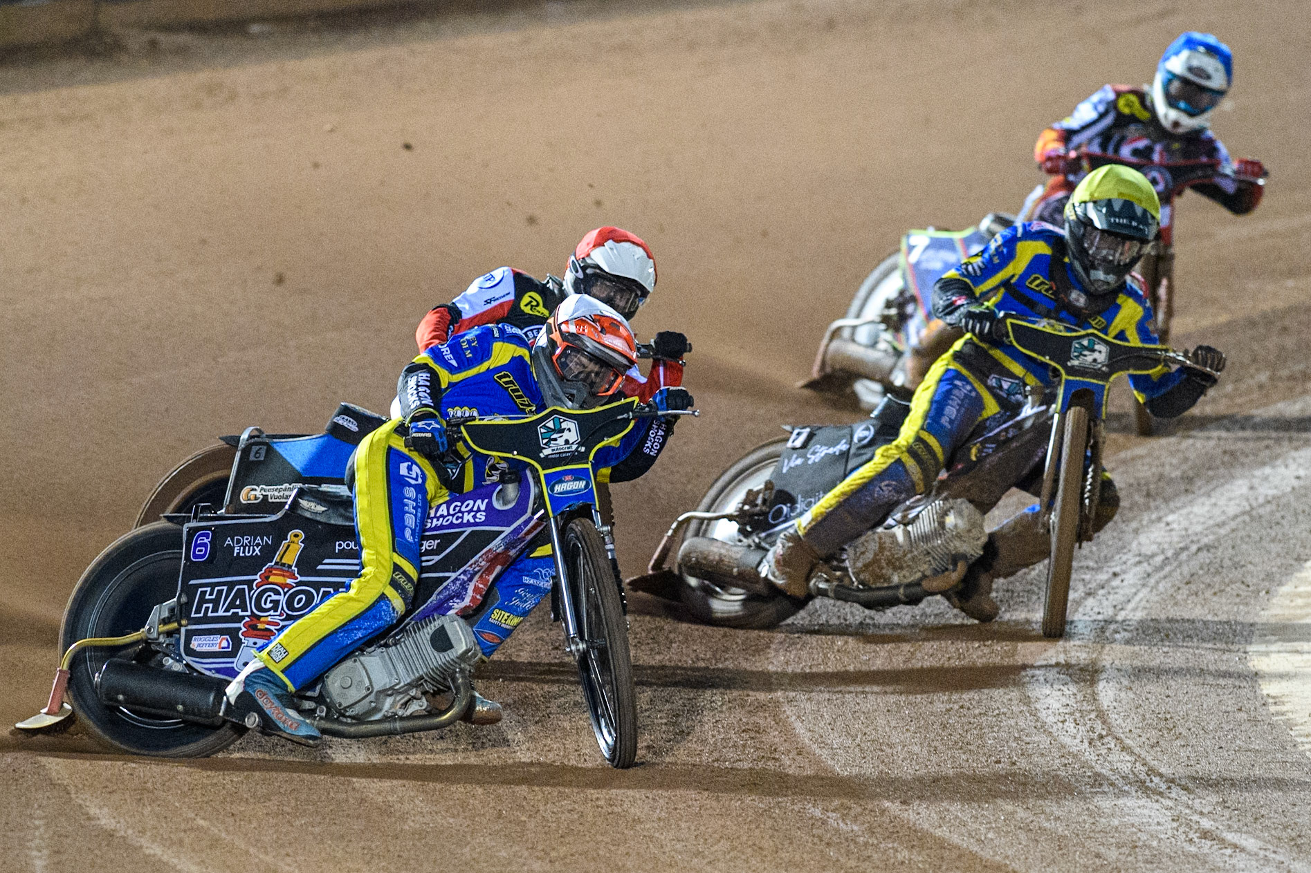 Sheffield Tigers' Jason Edwards  in White leading Belle Vue Aces' Antti Vuolas  in Red, Sheffield Tigers' Dan Gilkes  in Yellow and Belle Vue Aces' Jake Mulford  in Blue during the Rowe Motor Oil Premiership Play Off Semi Final 2, 1st Leg match between Belle Vue Aces and Sheffield Tigers at the National Speedway Stadium, Manchester on Monday 16th September 2024. (Photo: Ian Charles | MI News)
