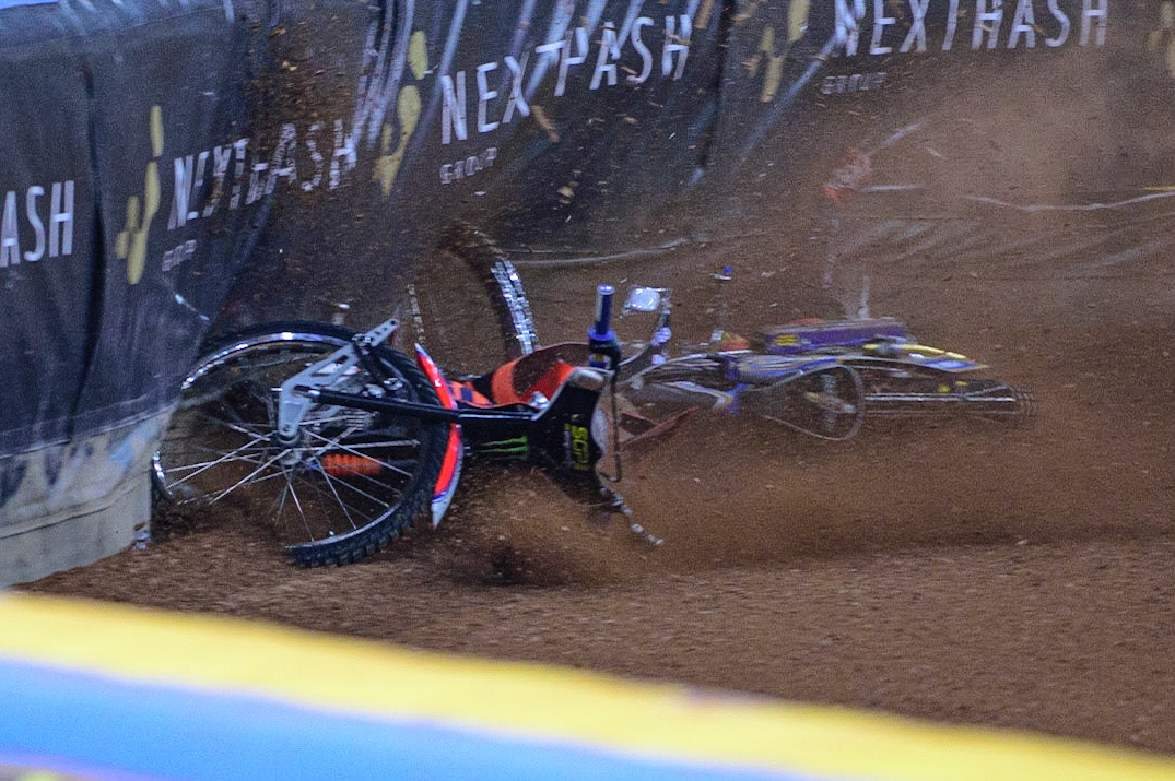 Andžejs Ļebedevs (29) (White) collides with Jason Doyle (69) (Yellow) on the opening turn during the FIM  Speedway Grand Prix of Great Britain at the Principality Stadium, Cardiff on Saturday 13th August 2022. (Credit: Ian Charles | MI News