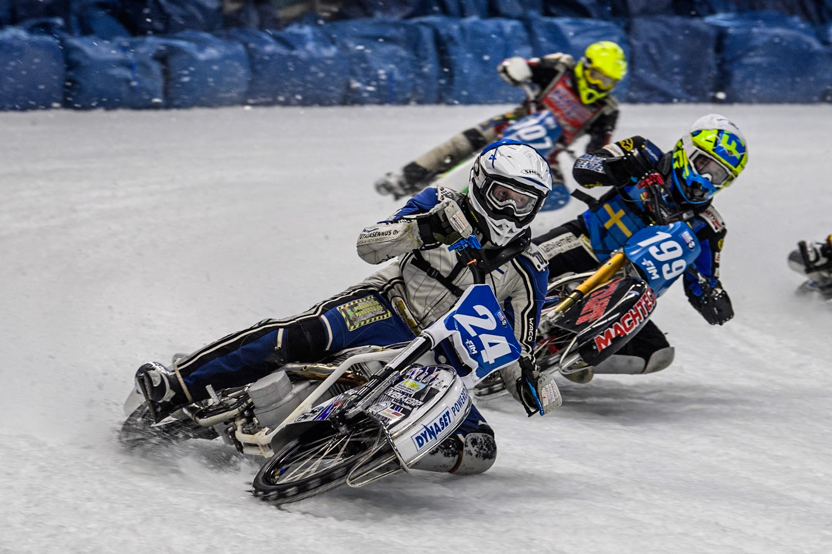 Finland's Max Koivula (24)  (Blue) leads  Sweden's Martin Haarahiltunen (199)  (White) and Czech Republic's Andrej Diviš (107) (Yellow) during the FIM Ice Speedway Gladiators World Championship Final 2 at the Max-Aicher-Arena, Inzell on Sunday 24 March 2024. (Photo: Ian Charles | MI News)