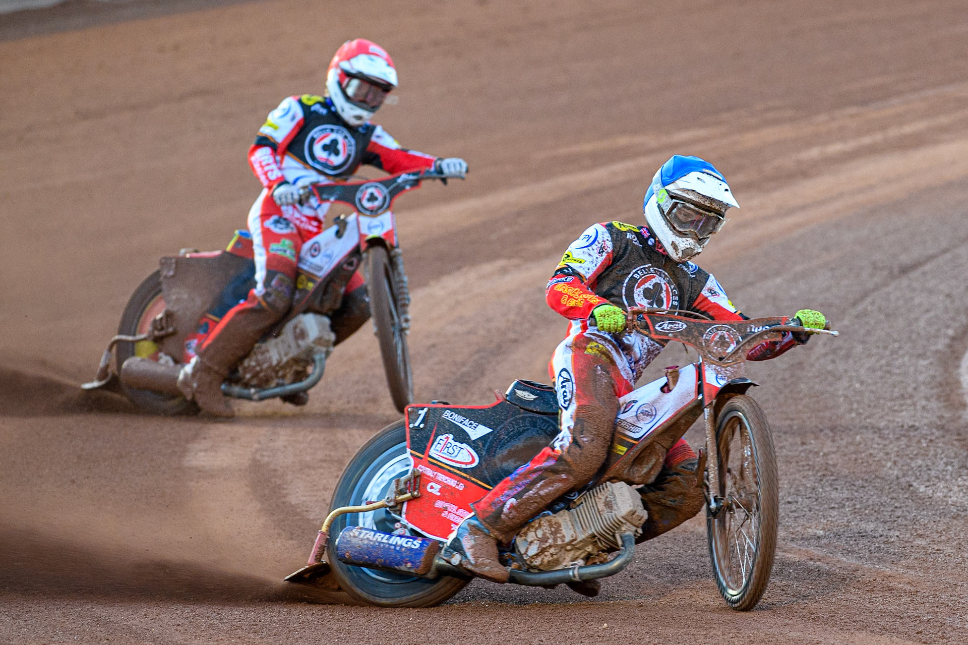 Jake Mulford of Belle Vue Aces in Blue leading team mate Tate Zischke in Red during the Rowe Motor Oil Premiership match between Belle Vue Aces and King's Lynn Stars at the National Speedway Stadium, Manchester on Monday 5th April 2025. (Photo: Ian Charles | MI News)