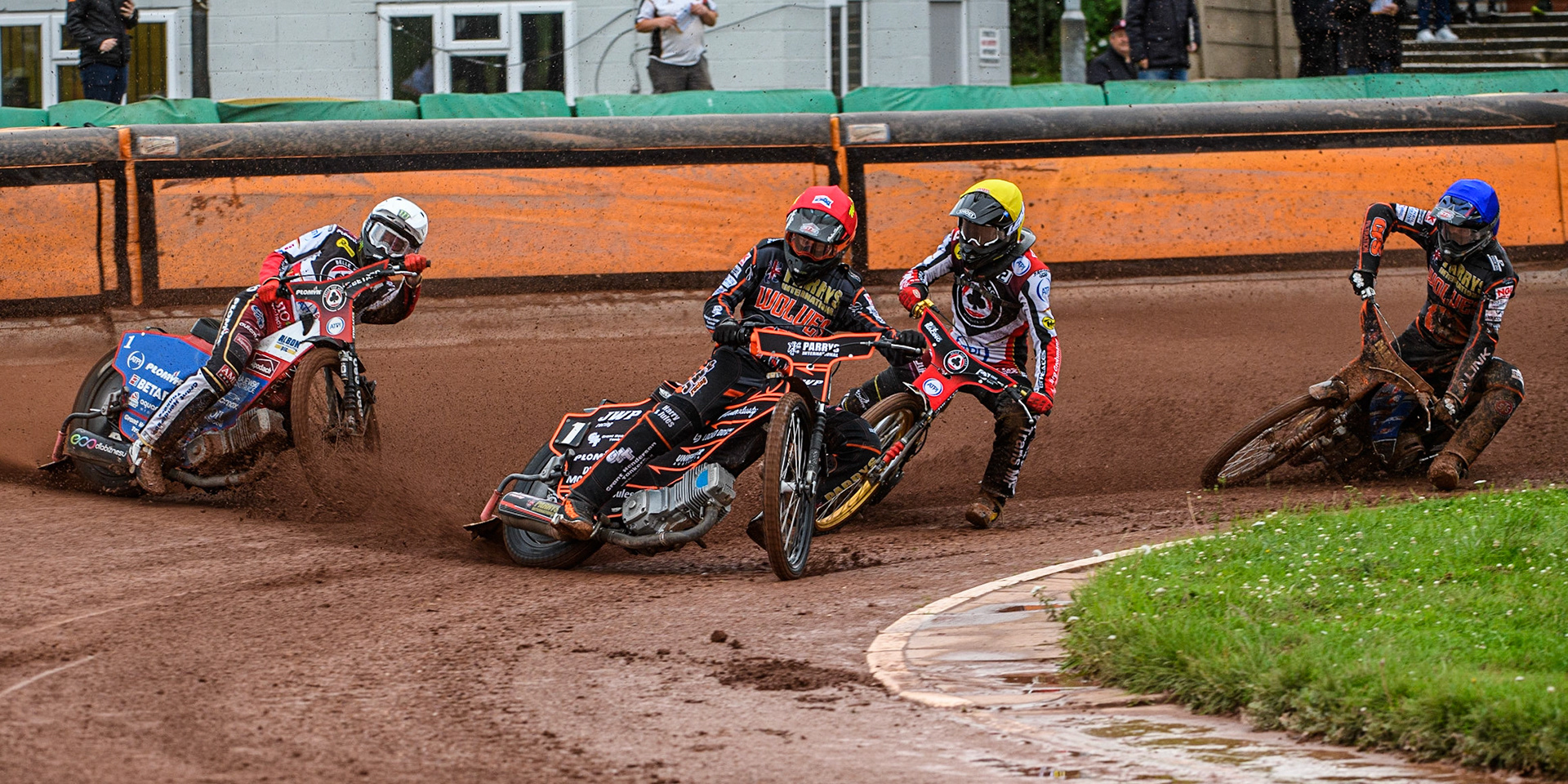 Sam Masters (Red) leads Dan Bewley (White), Norick Blodorn (Yellow) and Steve Worrall (Blue) during the Sports Insure Premiership match between Wolverhampton Wolves and Belle Vue Aces at Monmore Green Stadium, Wolverhampton on Monday 10th July 2023. (Photo: Ian Charles | MI News)