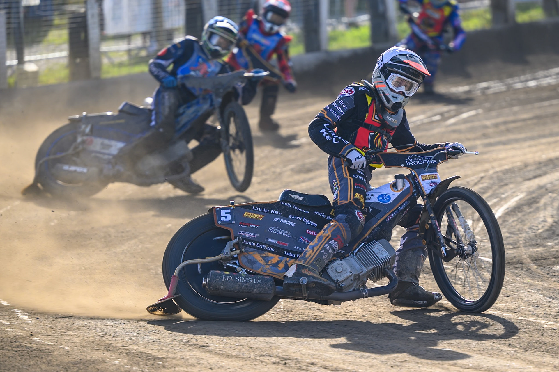 Ryan Ingram of Leicester Lion Cubs   in White leading Charlie Southwick, Guest Rider for Buxton Bulls   in Blue and Luke Harris of Buxton Bulls   in Red during the WSRA National Development League match between Buxton Bulls and Leicester Lion Cubs at Hi-Edge Speedway, Buxton on Sunday 4th October 2026. (Photo: Ian Charles | MI News)